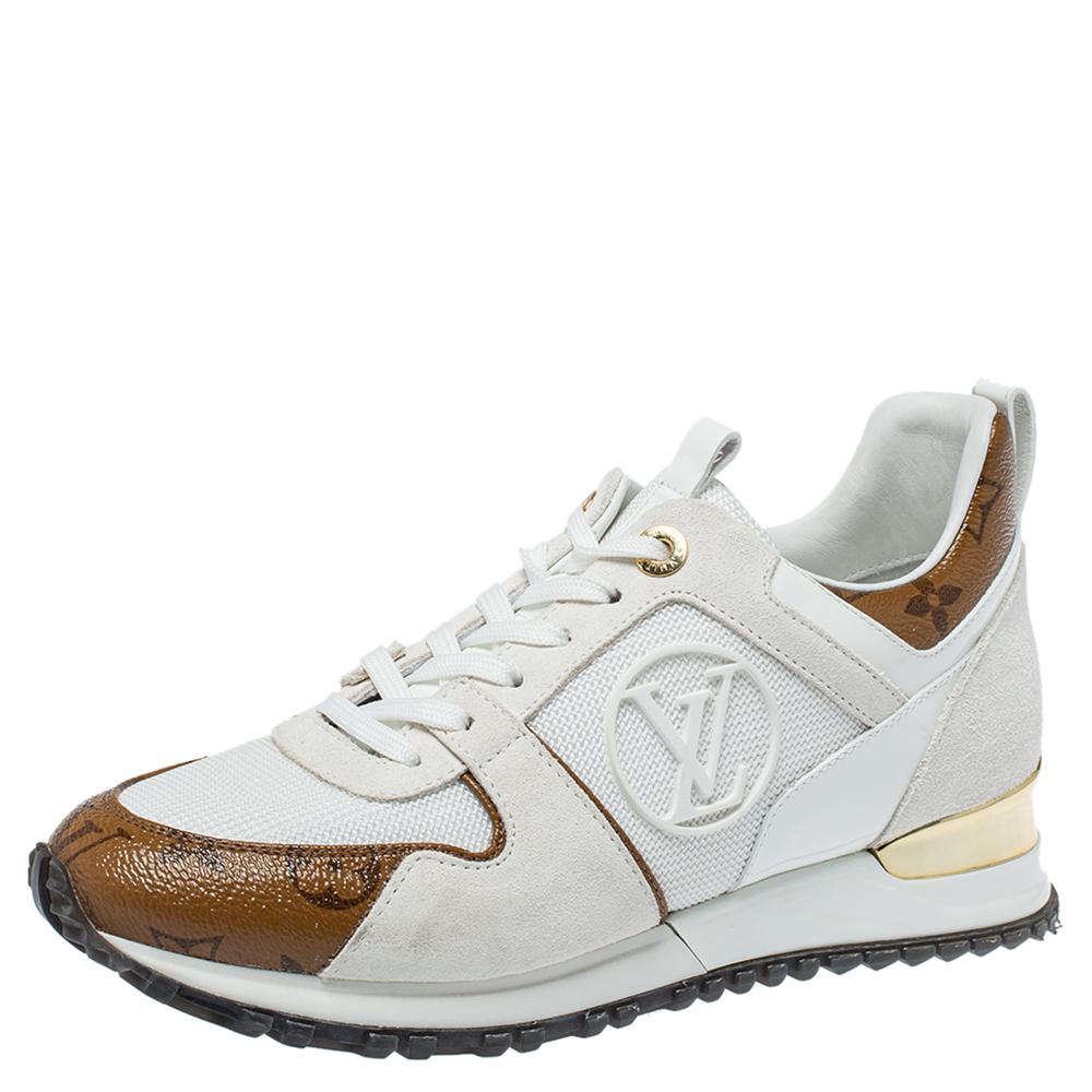 Made to provide comfort, these Run Away sneakers by Louis Vuitton are trendy and stylish. They've been crafted from mesh, patent leather, monogram canvas, suede, and designed with lace-up vamps and the label's logo on the side panels and the heel