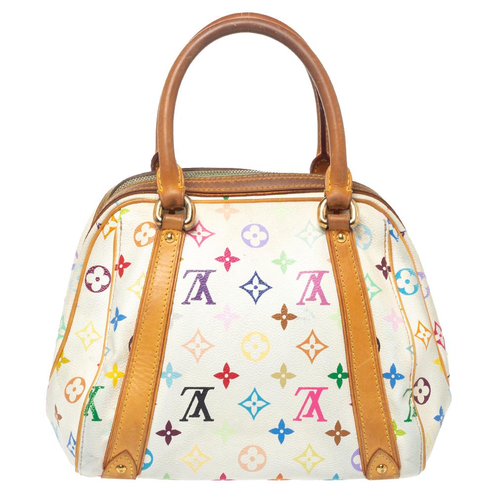 Es ist der Traum jeder Frau:: eine so ansprechende Handtasche von Louis Vuitton zu besitzen. Diese Tasche ist aus dem charakteristischen mehrfarbigen Monogram Canvas gefertigt und verfügt über zwei Ledergriffe:: einen Reißverschluss an der Oberseite