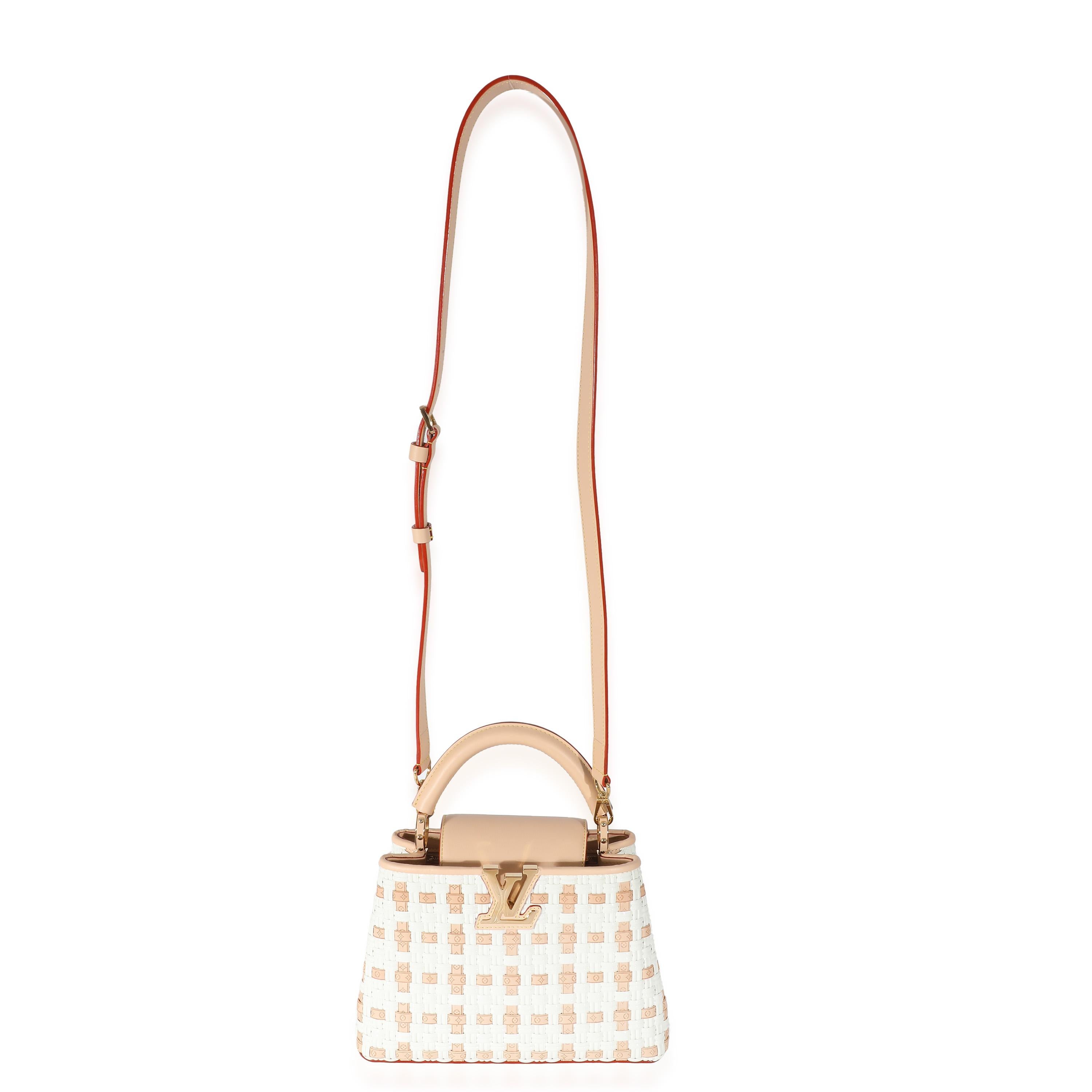 Listing Title: Louis Vuitton White Monogram Wicker Woven LV Heavenly Capucines BB
SKU: 135542
MSRP: 7300.00 USD
Condition: Pre-owned 
Handbag Condition: Excellent
Condition Comments: Item is in excellent condition and displays light signs of wear.