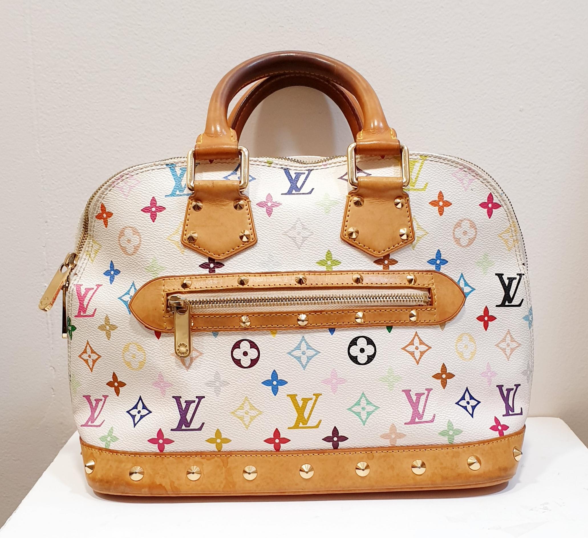 This Louis Vuitton Monogram Multicolor Alma Bag is made for anyone with impeccable taste. It features quality details such as golden studs throughout the leather trim. With its classic shape and roomy interior, this stunning piece will also make a
