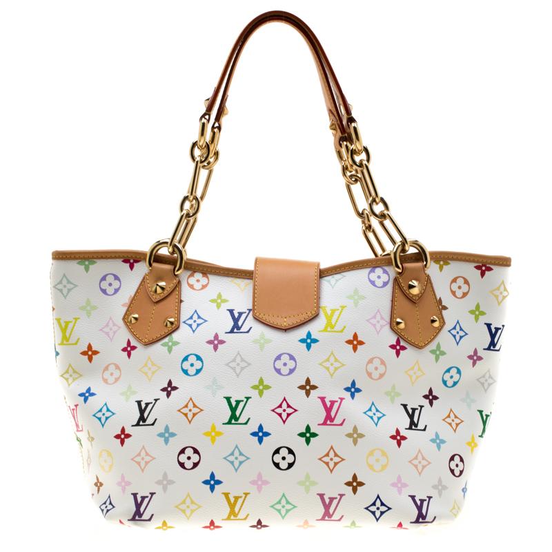 Add great style to your everyday getup with this in vogue Louis Vuitton bag. The Annie bag is crafted from the signature monogram canvas. Stow all your belongings inside the suede interior of this creation. With two top handles, it features a twist