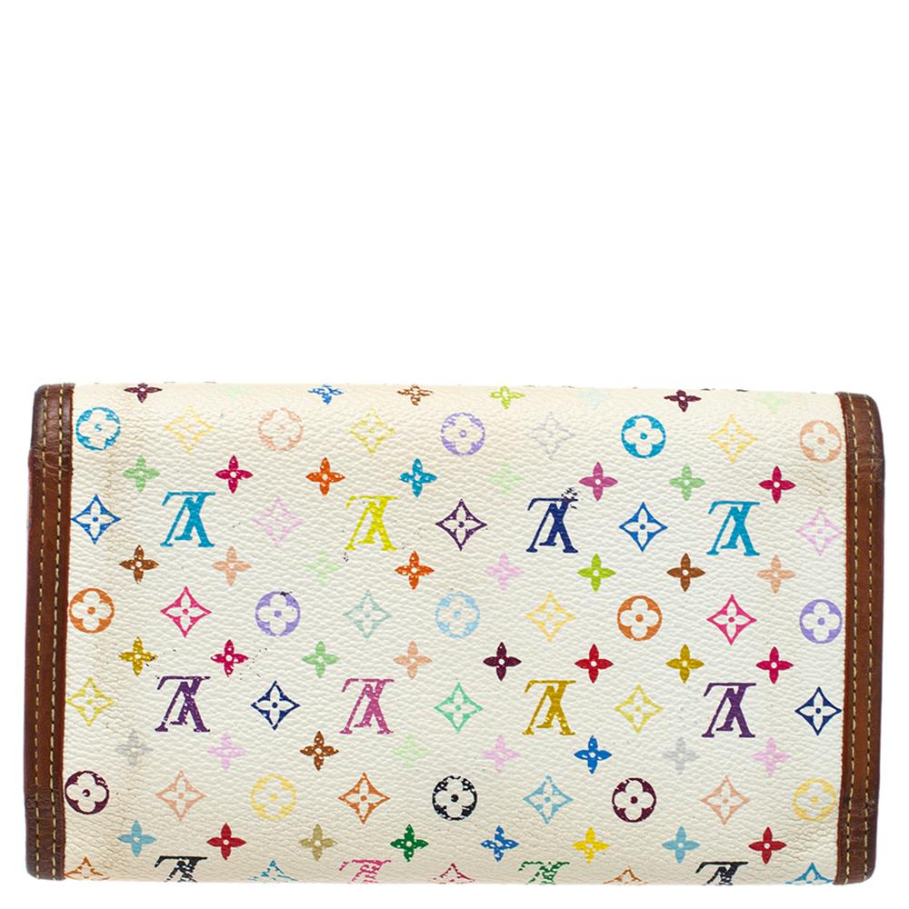 Functional luxury from Louis Vuitton, this Porte Tresor Trifold wallet is made from multicolored monogram coated canvas and leather trims. Its smart exterior has a fold-over structure and features a snap button closure on the front face. Neatly