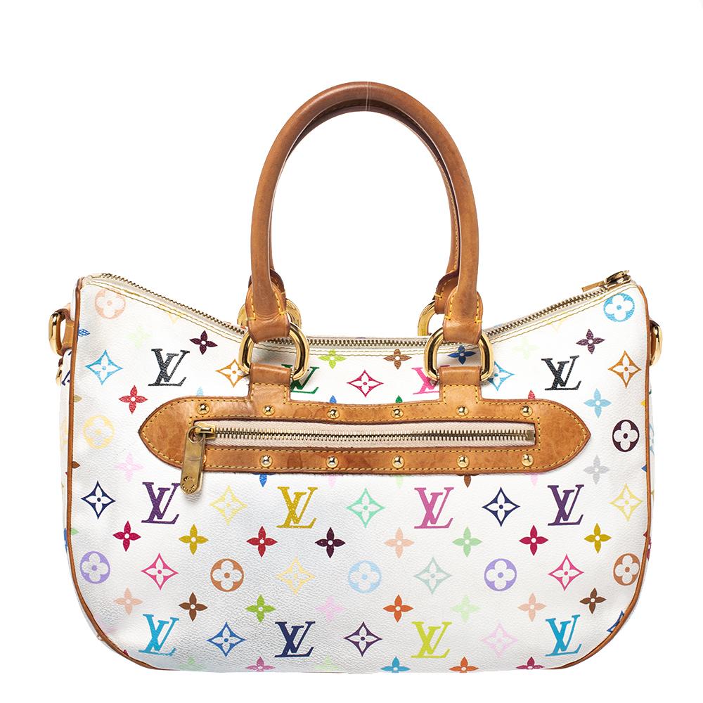 A bag as lovely as this one from Louis Vuitton deserves to be in every woman's closet. Crafted from white monogram canvas and leather, this bag features two top handles, a removable shoulder strap, and Gold Tone hardware. While the front flap pocket