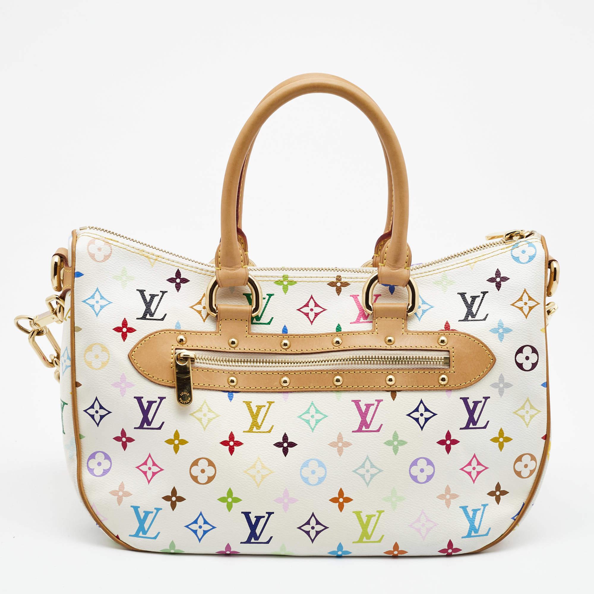 A bag as lovely as this one from Louis Vuitton deserves to be in every woman's closet. Crafted from white monogram canvas and leather, this bag features two top handles, a shoulder strap, and gold-tone hardware. While the front flap pocket elevates