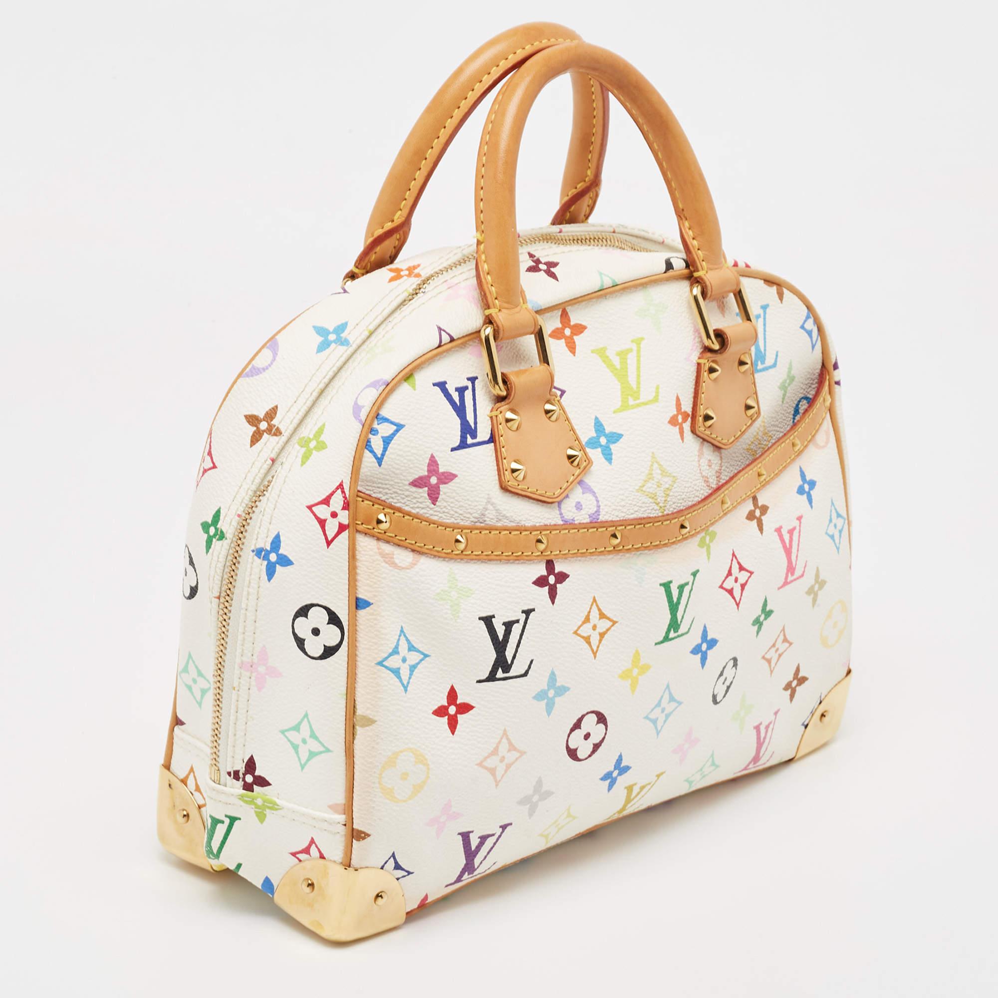 The Louis Vuitton Takashi Murakami Trouville Bag is a luxurious and iconic accessory featuring the vibrant collaboration between Louis Vuitton and Japanese artist Takashi Murakami. The bag showcases the signature LV monogram in a playful multicolor