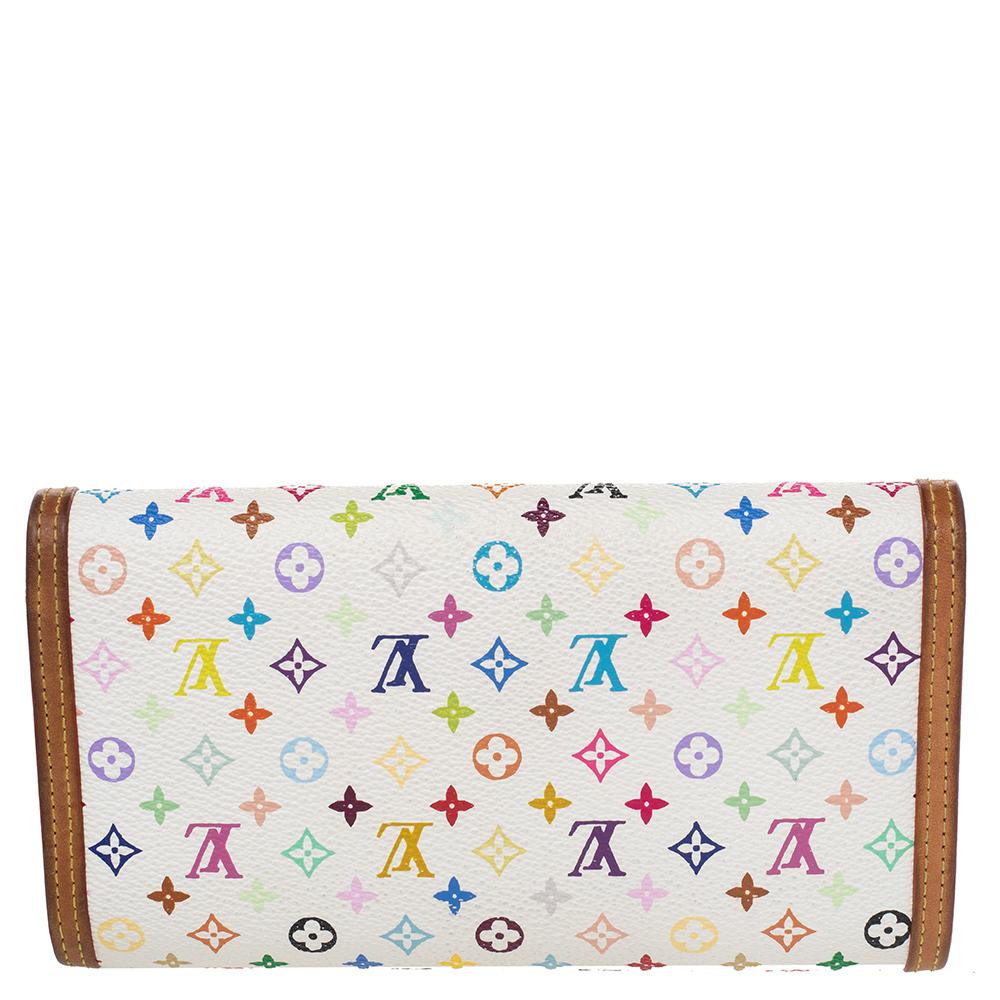 Functional luxury from Louis Vuitton, this Porte Tresor Trifold wallet is made from multicolored monogram coated canvas and leather trims. Its smart exterior has a fold-over structure and features a snap button closure on the front face. Neatly