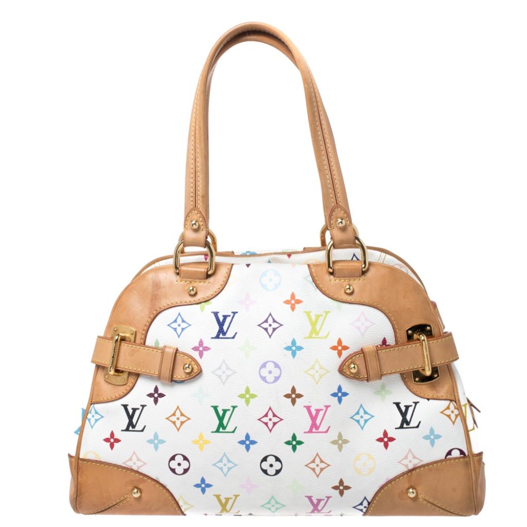 This Claudia is a beauty like all the other Louis Vuitton bags. It comes crafted from signature Multicolore Monogram canvas and designed distinctly with contrast piping, buckles and a well-sized Alcantara interior secured by a zipper. Dual handles