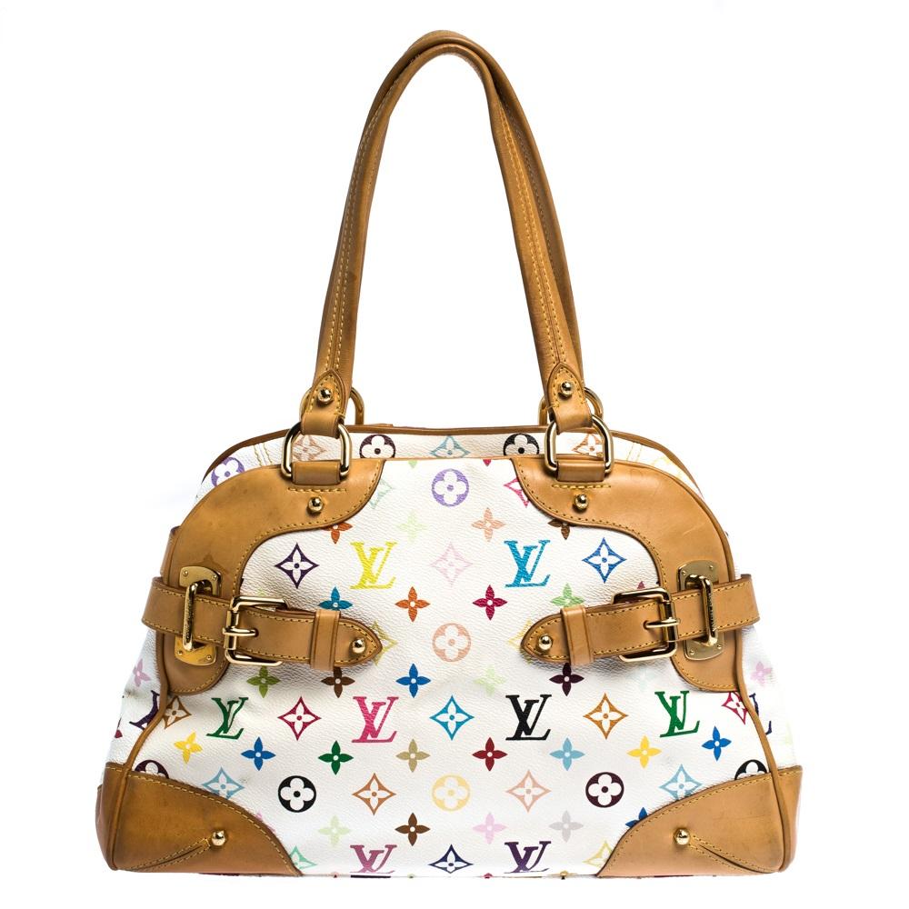 This Claudia is a beauty like all the other Louis Vuitton bags. It comes crafted from signature Multicolore Monogram canvas and designed distinctly with contrast leather trims, buckles and a well-sized Alcantara interior secured by a zipper. Dual