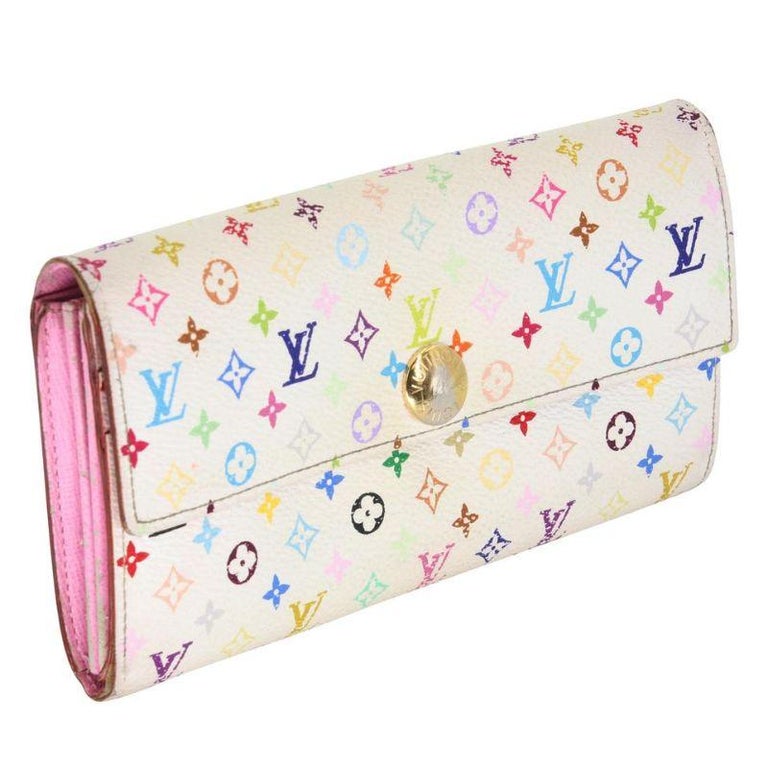 Louis Vuitton White Pink Sarah Takashi Murakami Monogram Multicolore Wallet

This Louis Vuitton White Monogram Multicolore Sarah Wallet is the most elegant way to organize your essentials like your bills, currency, credit cards and plenty of coins.