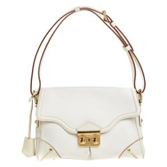 Louis Vuitton White Suhali Leather L
Essentiel PM Bag