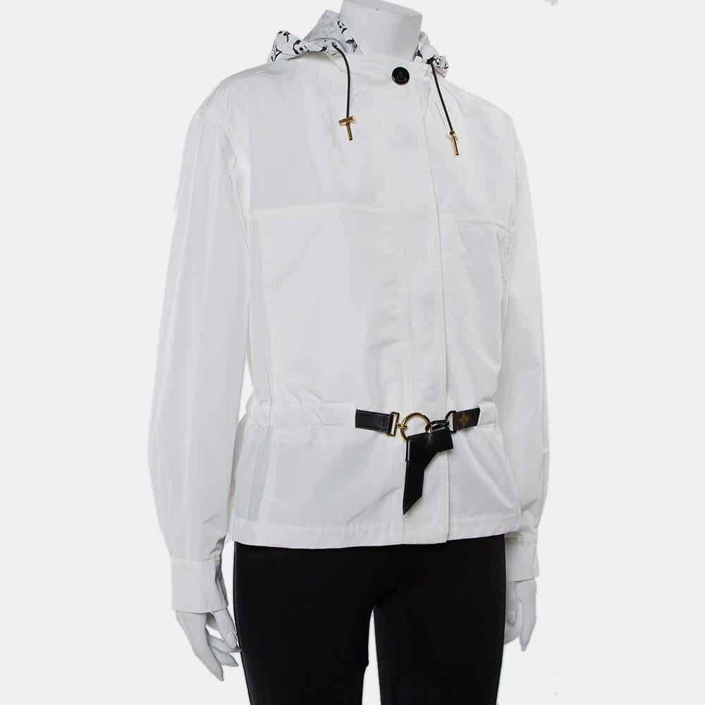 Louis Vuitton says this parka is just right for mid-season weather. Designed using quality fabric, the parka is lightweight and comfortable. It has long sleeves, a monogram-covered hood, and a belt to cinch the waist.

Includes: Brand tag, Extra