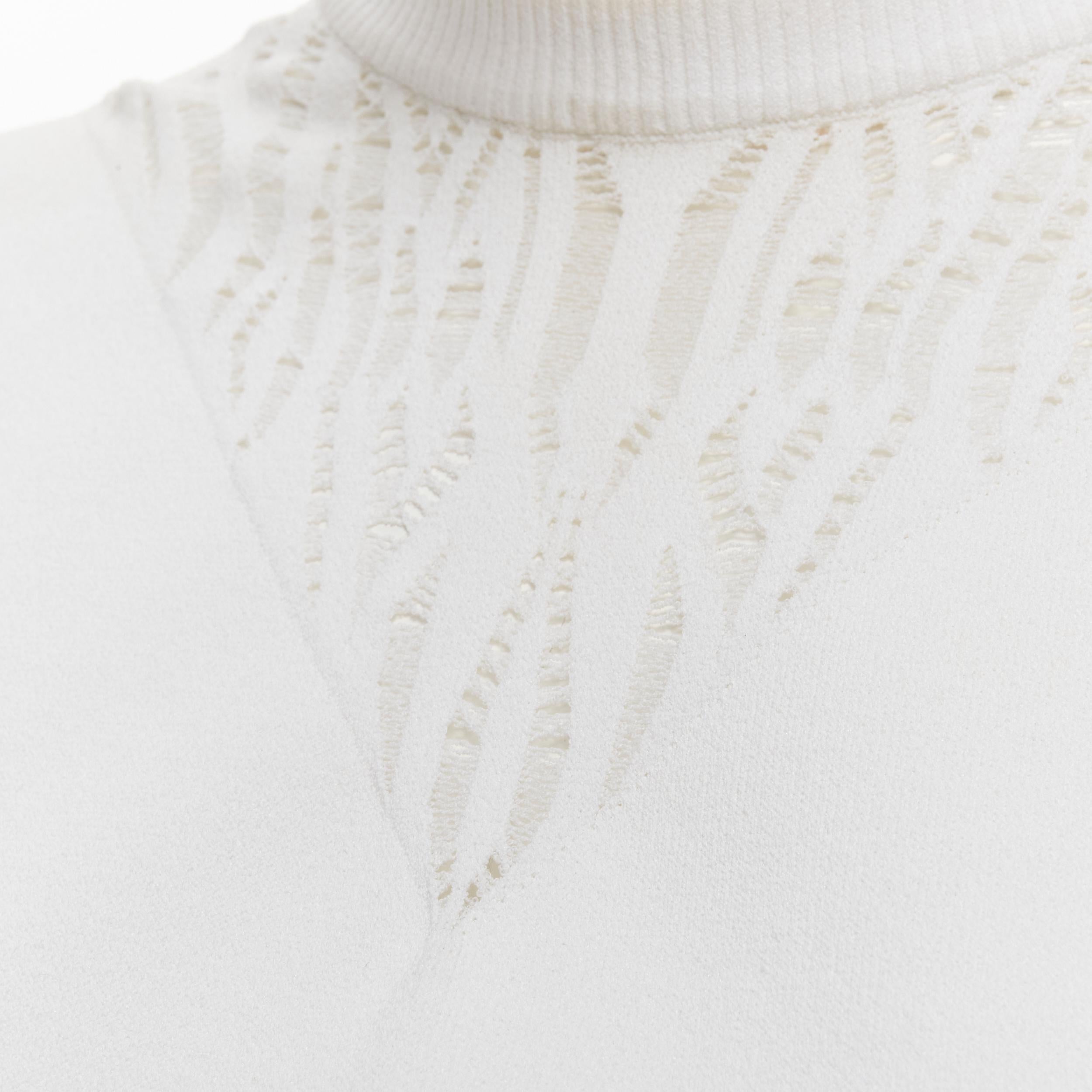 LOUIS VUITTON white viscose polyester lace knit collar sleeveless vest S 
Reference: LNKO/A01861 
Brand: Louis Vuitton 
Material: Viscose 
Color: White 
Pattern: Solid 
Extra Detail: Lace knit design at collar. 
Made in: Italy 

CONDITION: