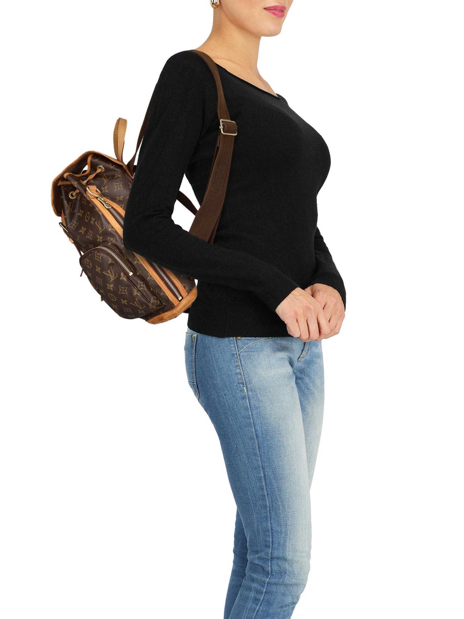 Product Description: From 2010 Collection
Bosphore, synthetic fibers, other patterns, monogram logo, buckle closure, gold-tone hardware, multiple pockets, day bag

Includes: N/A

Product Condition: Good
Lining: slightly visible stains. Hardware: