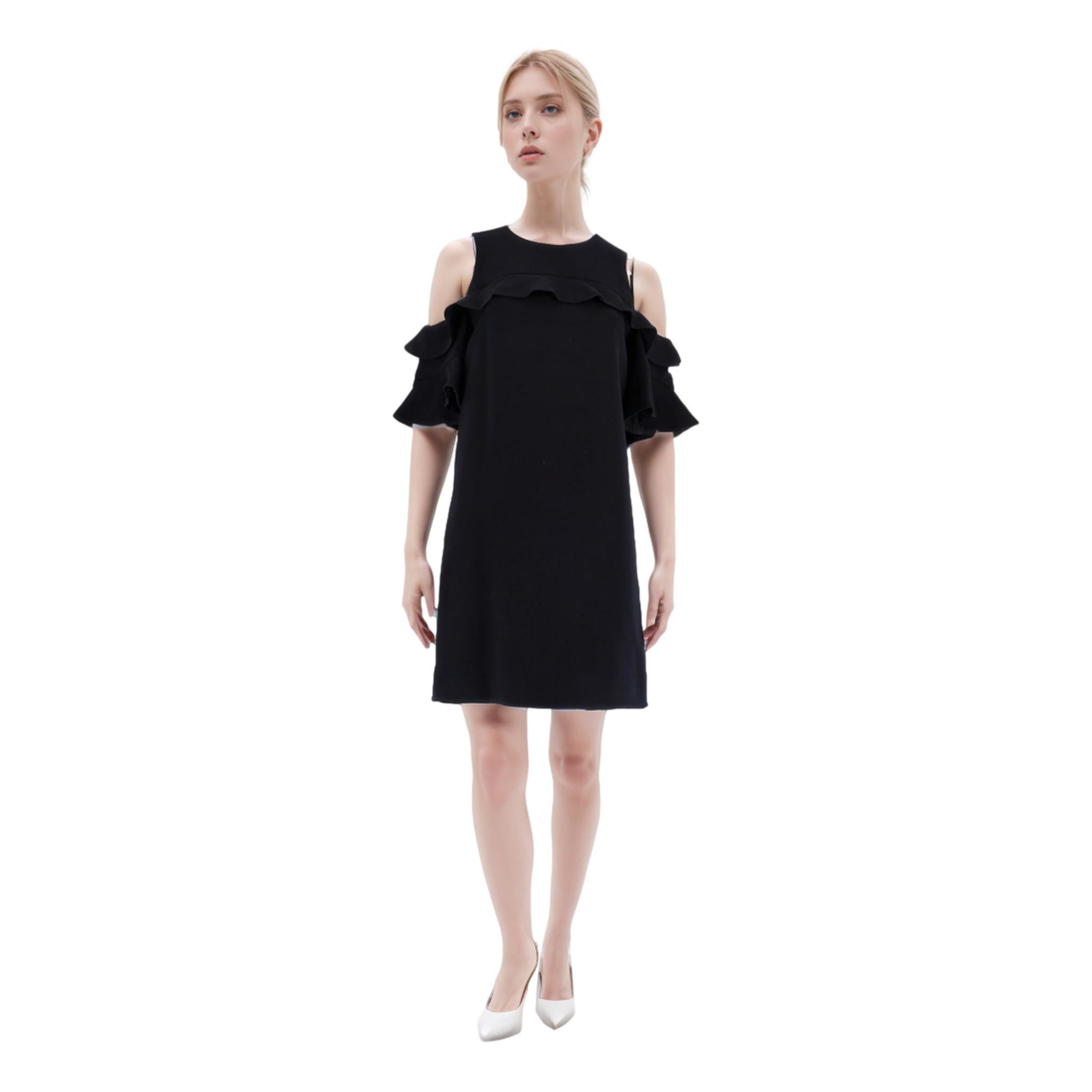 Louis Vuitton Wool & Silk Blend Cold-Shoulder Ruffle Dress

Black mini dress designed with frill detailing to the chest and cold-shoulder wide ruffle sleeves.

Featuring loose-fit silhouette and round neckline and concealed zip closure to rear,