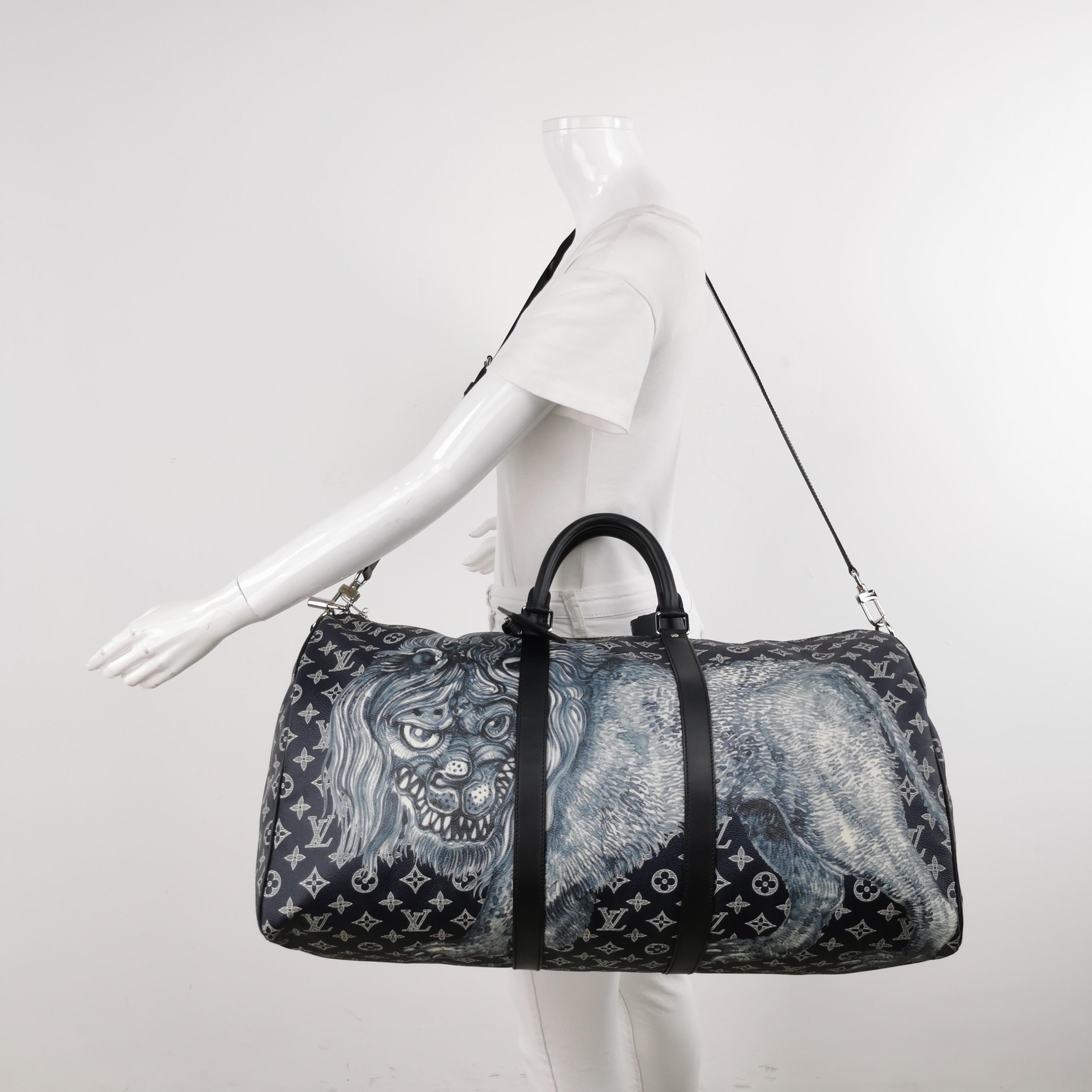 You’ll be roaring in style with this limited edition Louis Vuitton keepall. Part of the the Chapman Brothers x LV 2017 collection, this duffle features a lion motif against a midnight coated canvas and classic monogram print. The interior provides