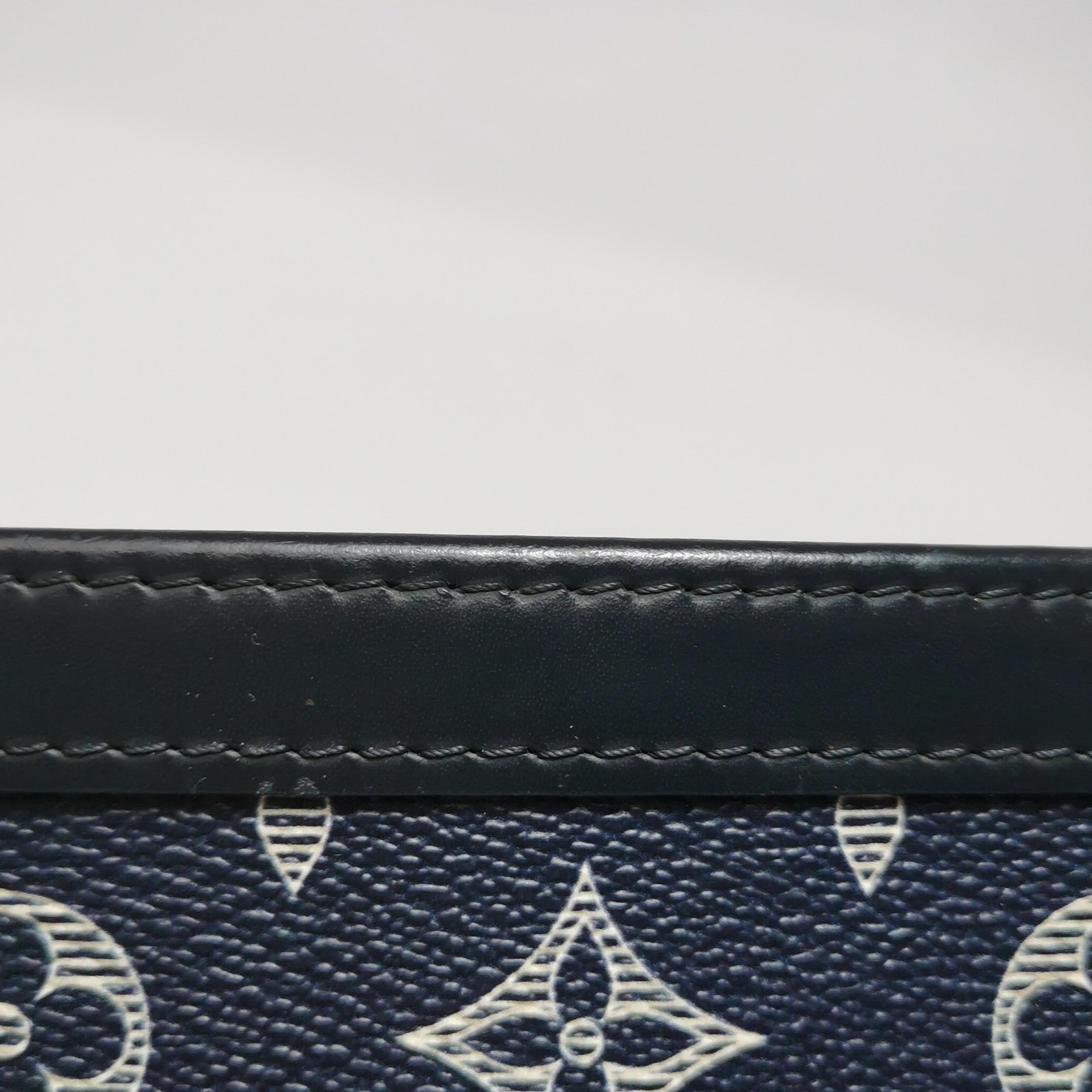 Louis Vuitton x Chapman Brothers Pochette Voyage Medium Lion Navy For Sale 7