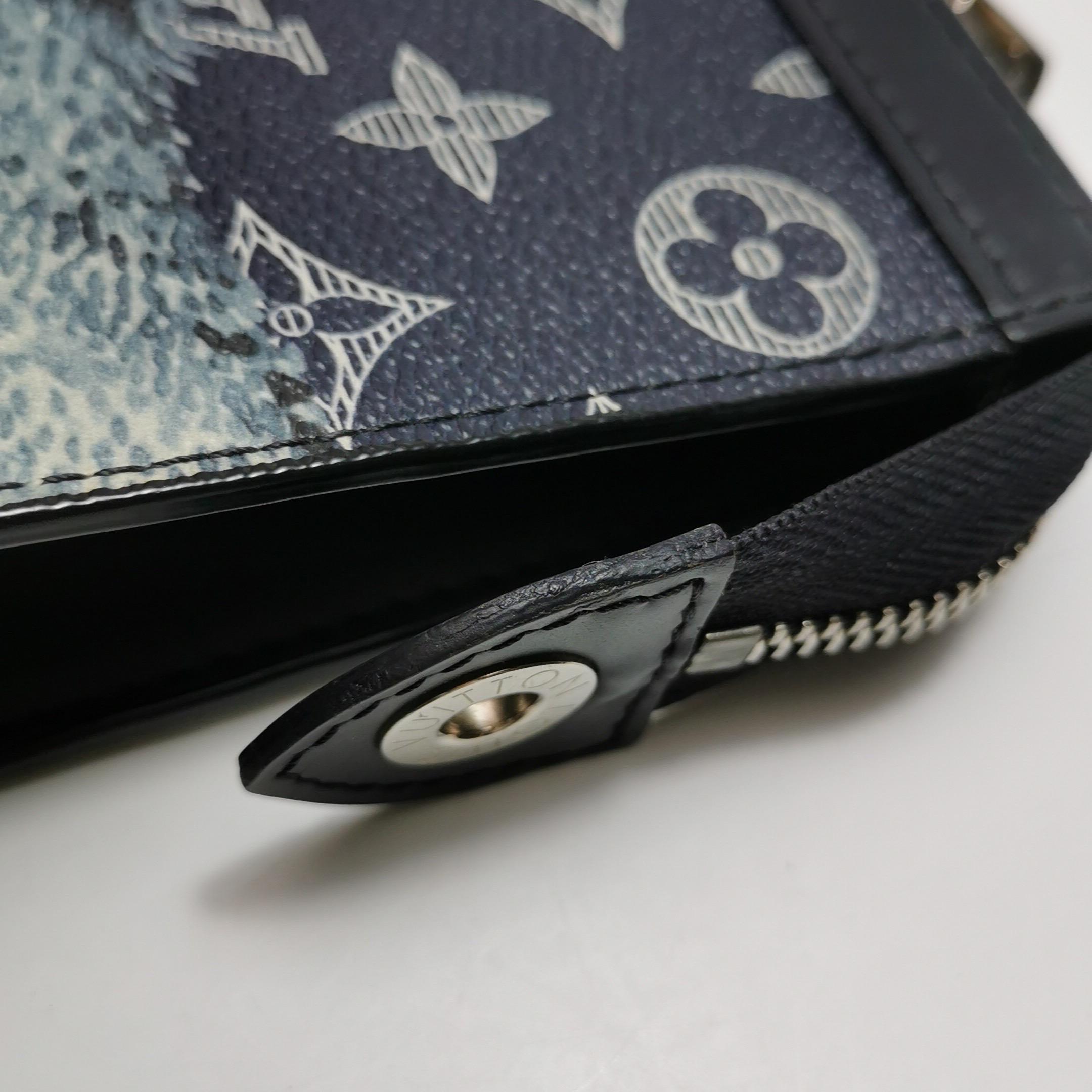 Louis Vuitton x Chapman Brothers Pochette Voyage Medium Lion Navy For Sale 9