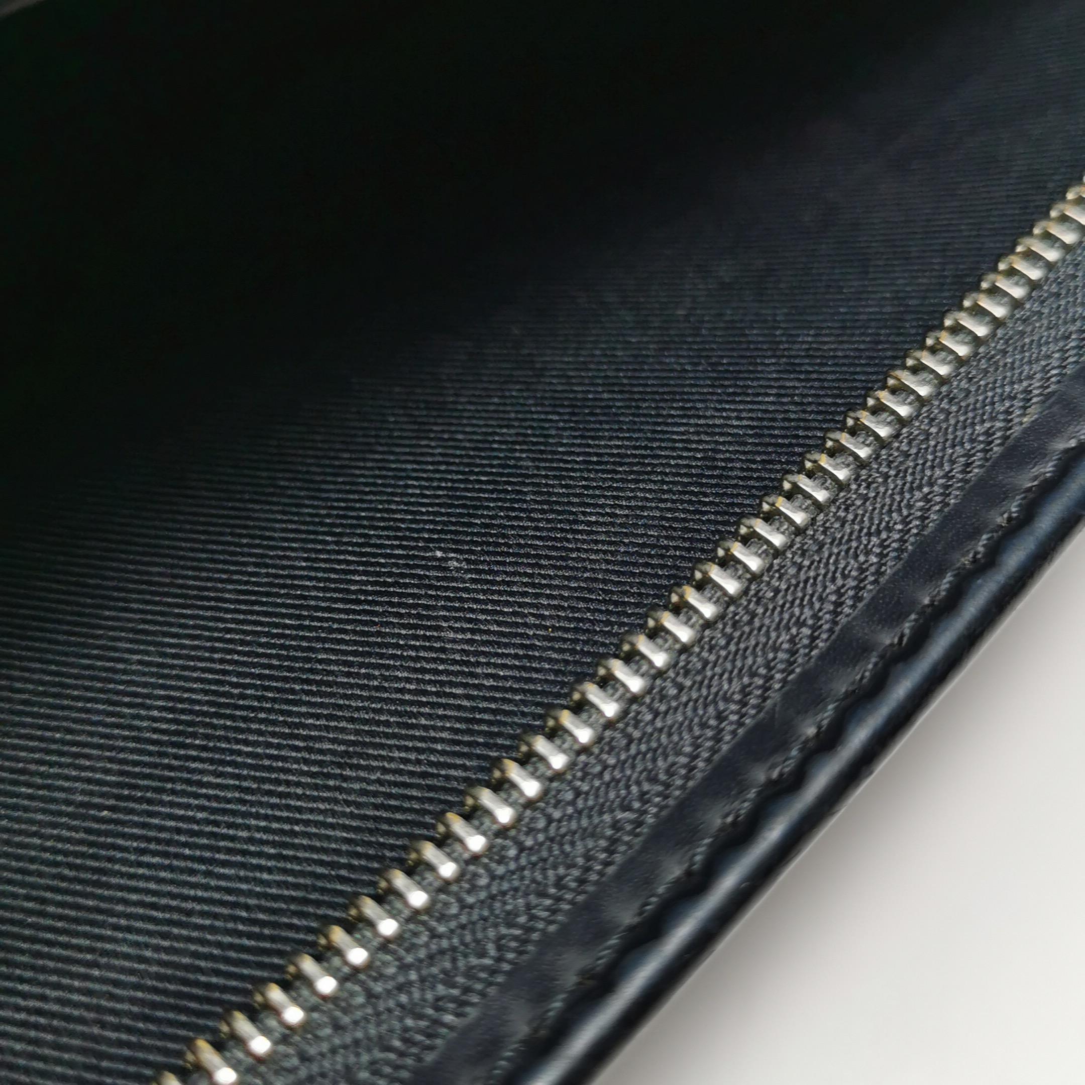 Louis Vuitton x Chapman Brothers Pochette Voyage Medium Lion Navy For Sale 2