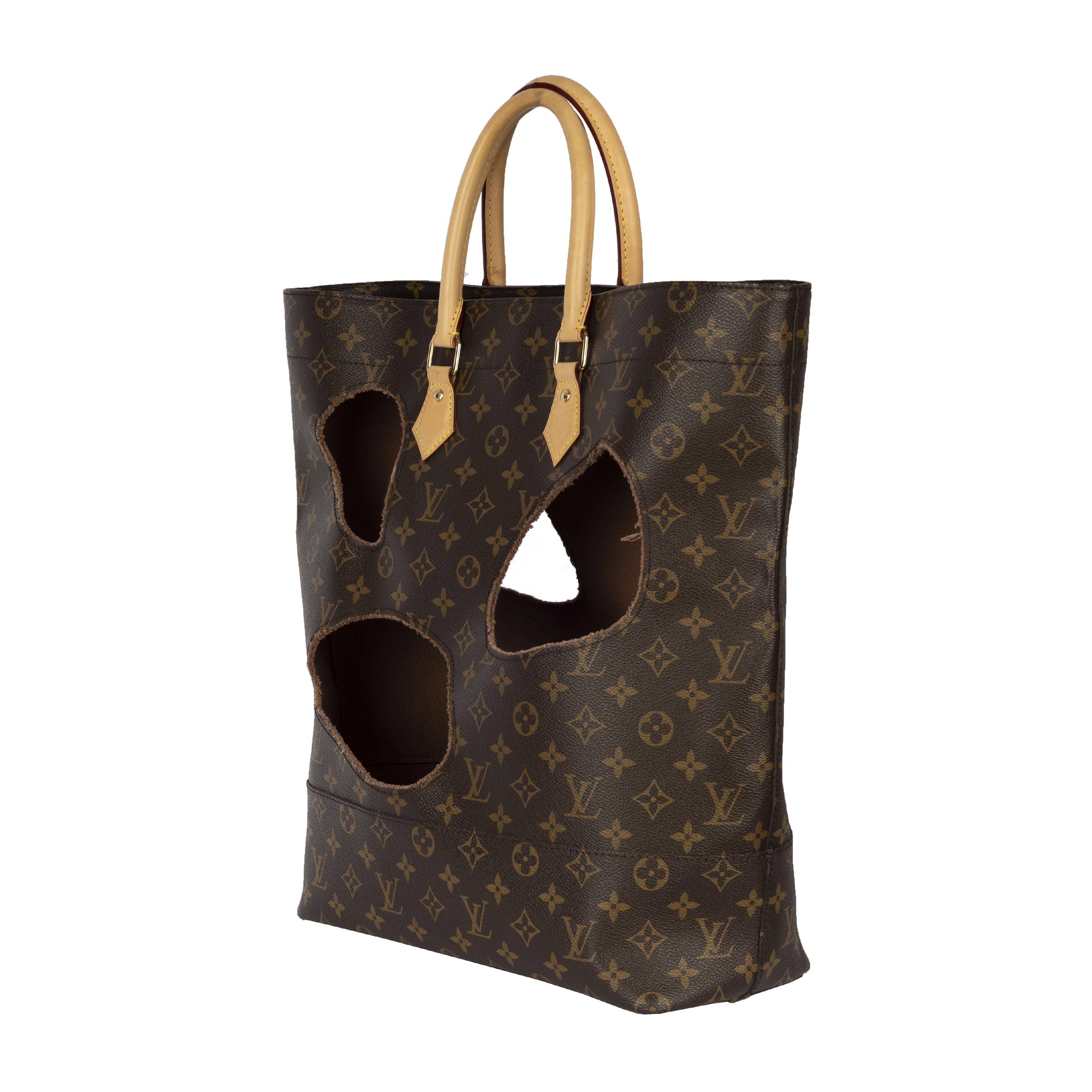 louis vuitton bag with holes