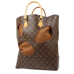 LOUIS VUITTON x Comme Des Garçons Monogram Brown Holes Gold Hardware Tote Bag