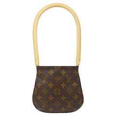 LOUIS VUITTON x Comme Des Garçons Monogram Top Handle Loop Mini Handbag