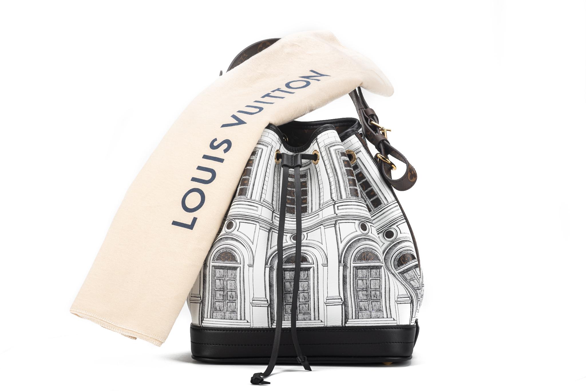 Louis Vuitton X Fornasetti Calfskin Monogram Architettura Noe NM in Black and White. This shoulder bag is a collaboration between Louis Vuitton and Fornasetti. The bag features a building print and Monogram coated-canvas trim and adjustable shoulder