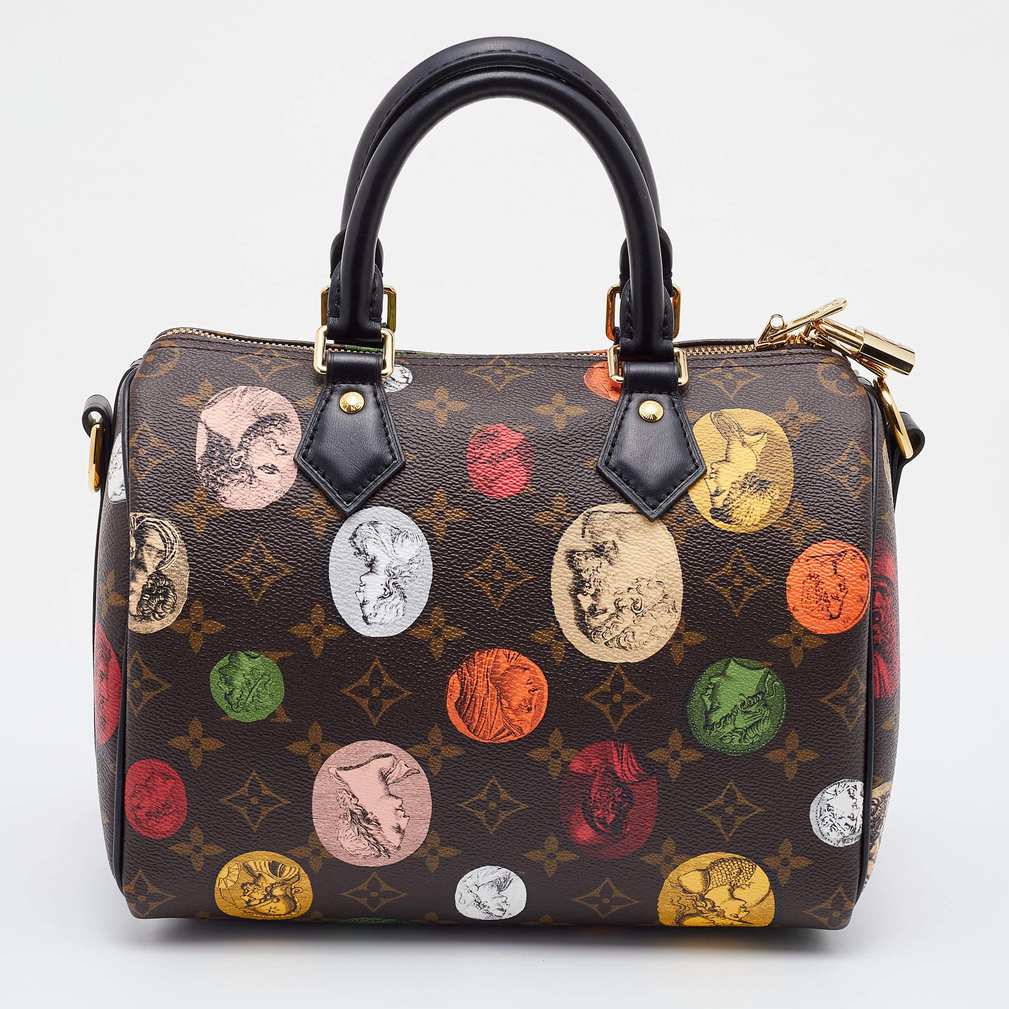 On LV's iconic Speedy, we witness prolific Italian artist Fornasetti's stunning artwork over the signature monogram prints. The Louis Vuitton X Fornasetti bag comes with dual handles, and eye-catching appeal, and an optional strap.

Includes: