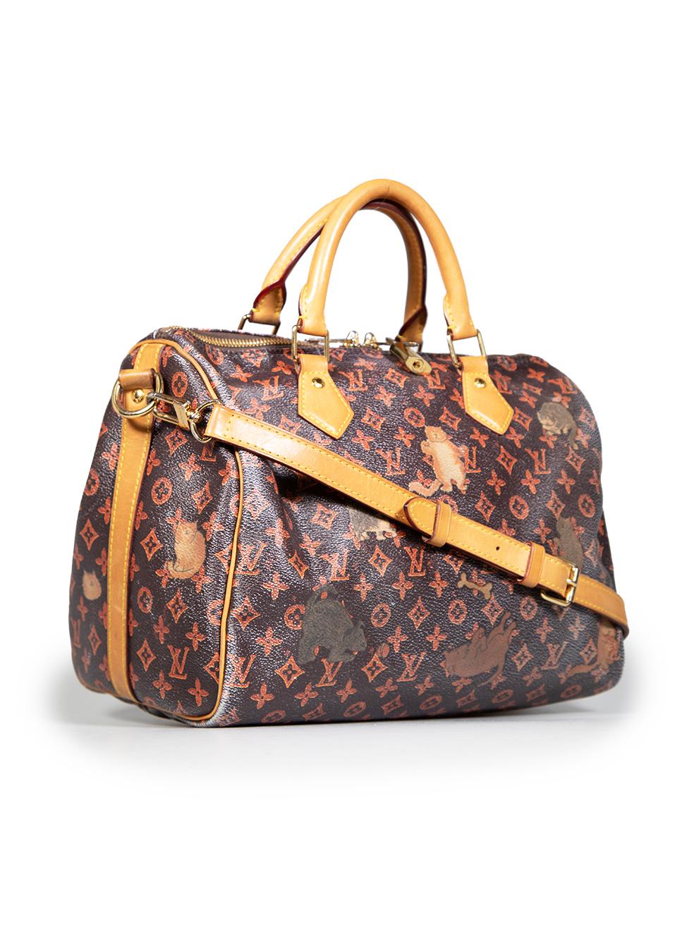 CONDITION is Good. General wear to bag is evident. Moderate signs of wear to the front, back, base and both sides where abrasion has caused the coating to rub off. Cracking on the top of the bag and abrasions and discolourations on the top handle