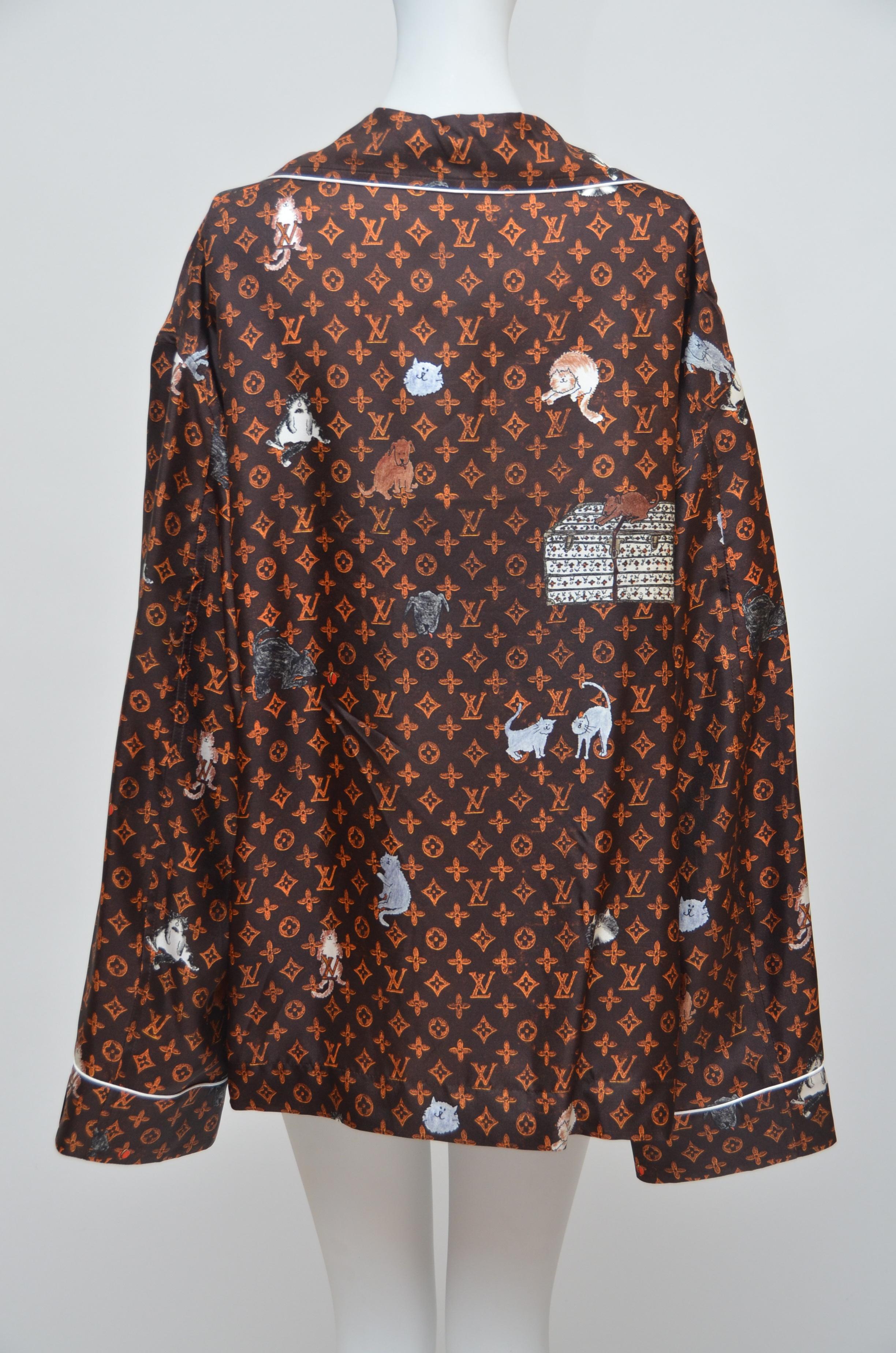 100% authentic  LOUIS VUITTON X  Grace Coddington Collaboration  Catogram Silk shirt
New with tags attached.
photographed on mannequin size 2US.
This piece is meant to be worn  oversized.
LV hanger and dust-bag included.
Size 40


FINAL SALE