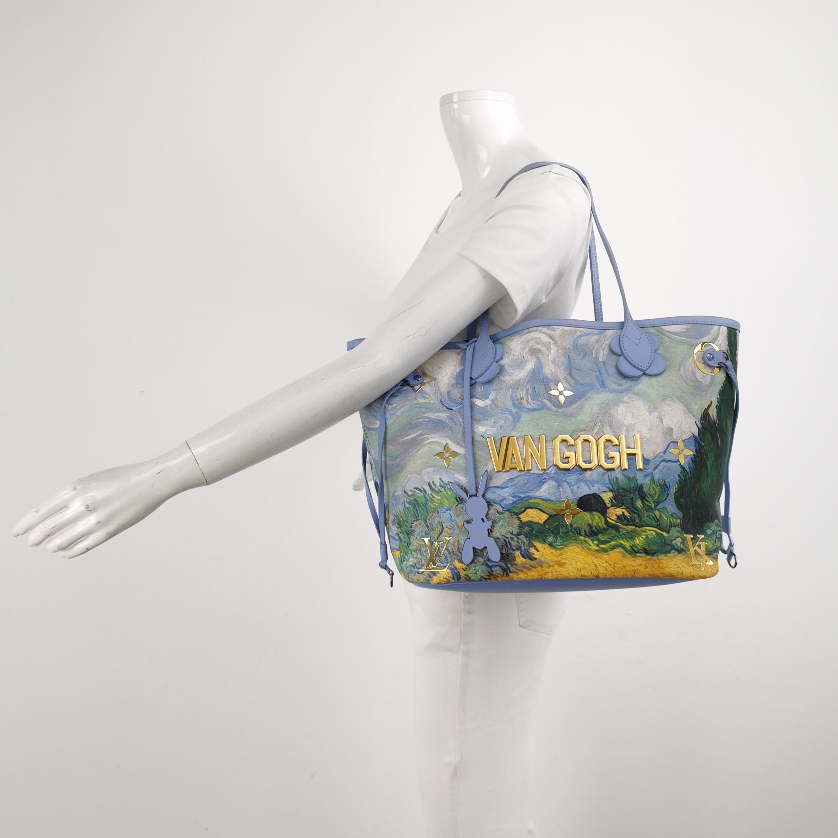 Discover the Van Gogh Neverfull MM tote bag, part of the exclusive Louis Vuitton x Jeff Koons Limited Edition Masters Collection. This highly sought-after piece is currently sold out at boutiques, making it a must-have for any Louis Vuitton