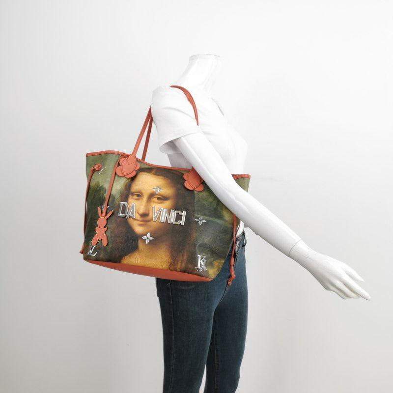 Louis Vuitton x Jeff Koons Monalisa Masters Neverfull MM Tote Medium
These are professional photos of the actual bag.
  
  Discover the da Vinci Monalisa Neverfull MM tote bag in Poppy, part of the exclusive Louis Vuitton x Jeff Koons Limited