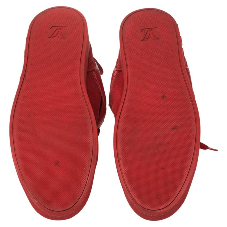 Detail shot of West s red Louis Vuitton Don sneakers