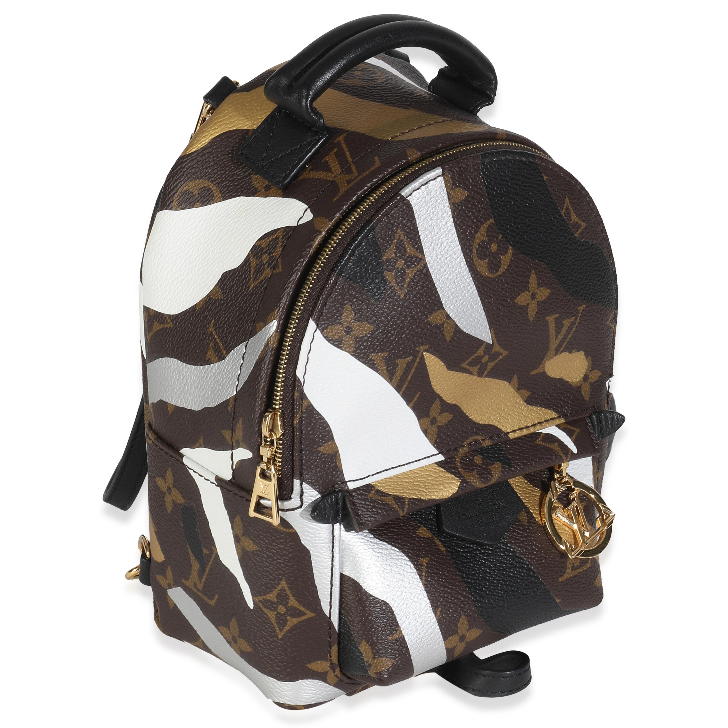 Listing Title: Louis Vuitton x LOL Gold Silver Monogram Canvas Mini Palm Springs
SKU: 148021
MSRP: 2690.00 USD
Condition: Pre-owned 
Handbag Condition: Excellent
Condition Comments: Item is in excellent condition and displays light signs of wear. 