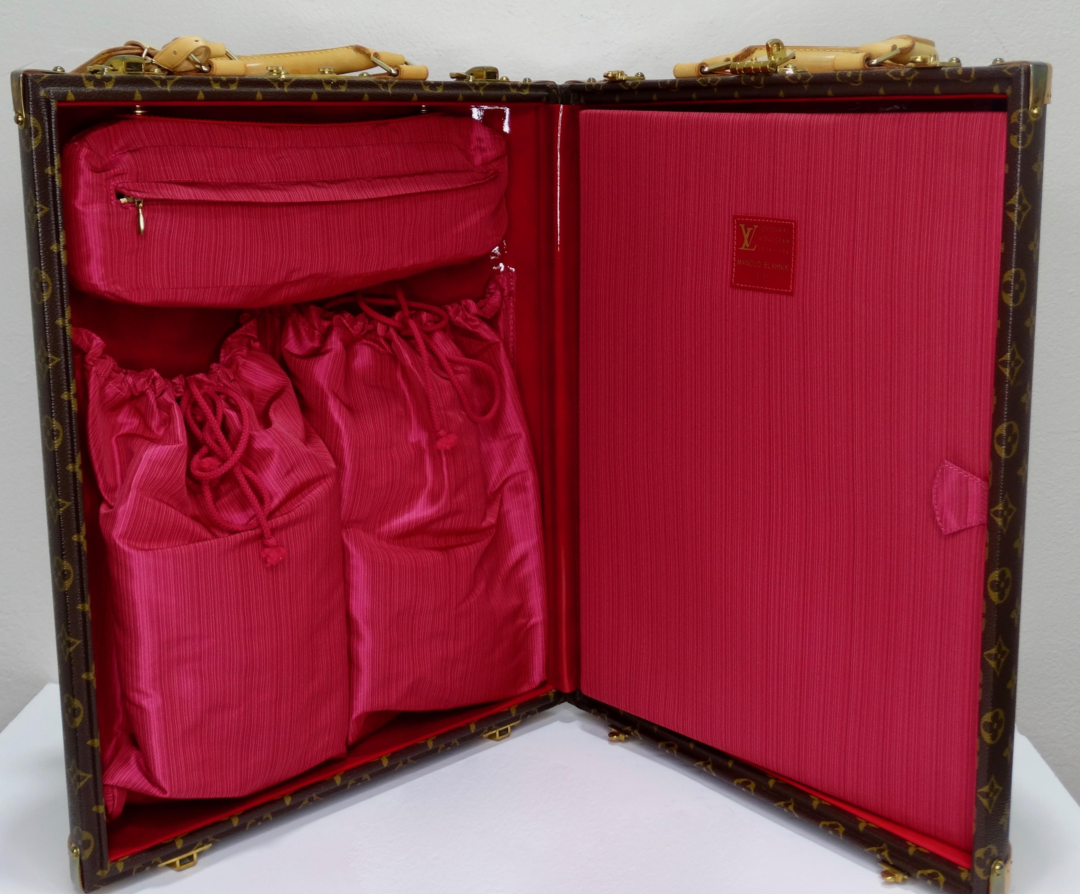 Carry your shoes or accessories in style with this this amazing LV x Manolo Blahnik trunk! Circa 1996, this ultra rare trunk is crafted from LV's classic monogram with a studded vachetta leather trim, brass hardware, dual top handles and bag tag.