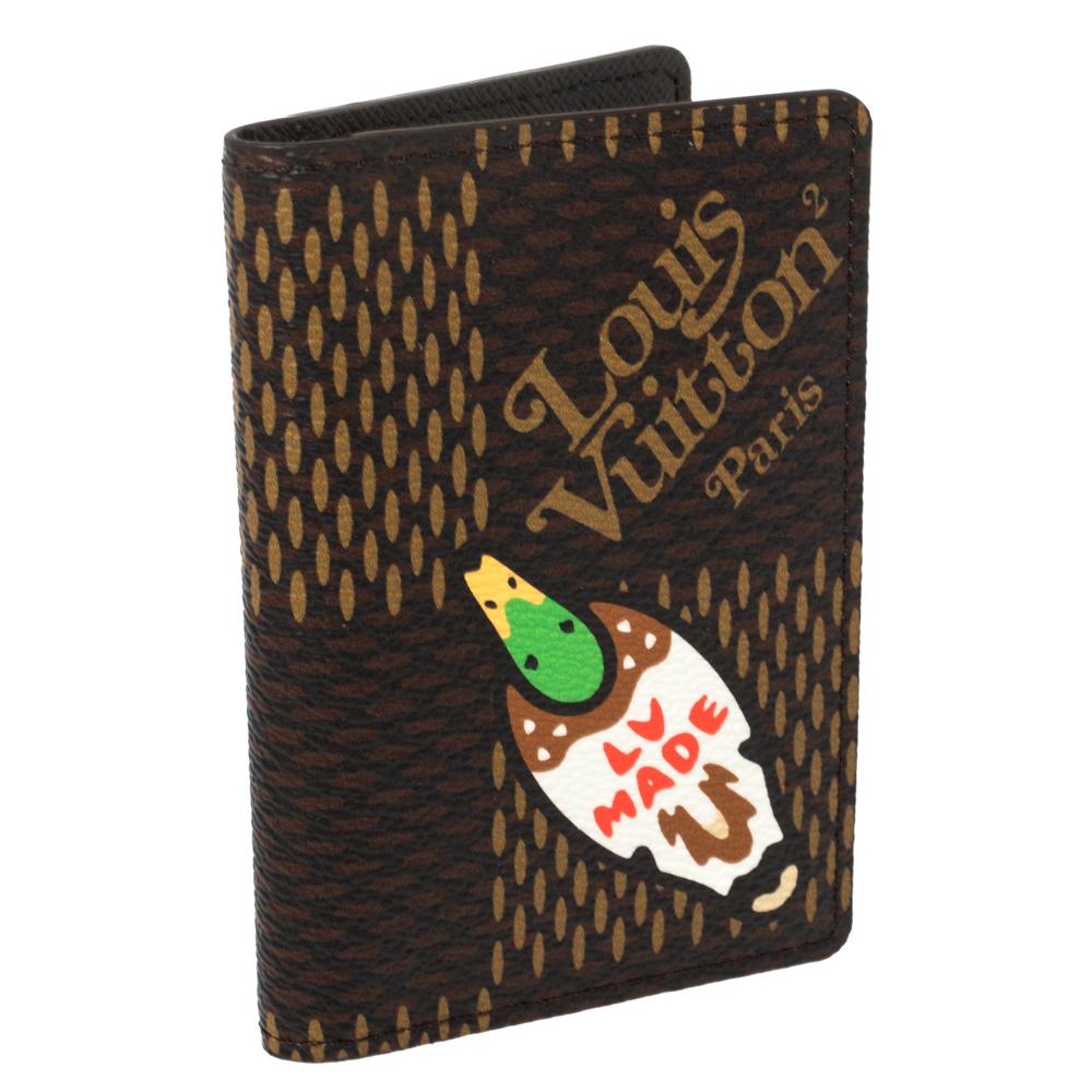 Streetwear icon, fashion designer, DJ, and Virgil Abloh's fashion guru, Nigo's collaboration with Louis Vuitton was highly popular. Carfted from Damier Ebene Giant canvas, this pocket organizer features a duck with 'LV MADE' lettering.

Includes: