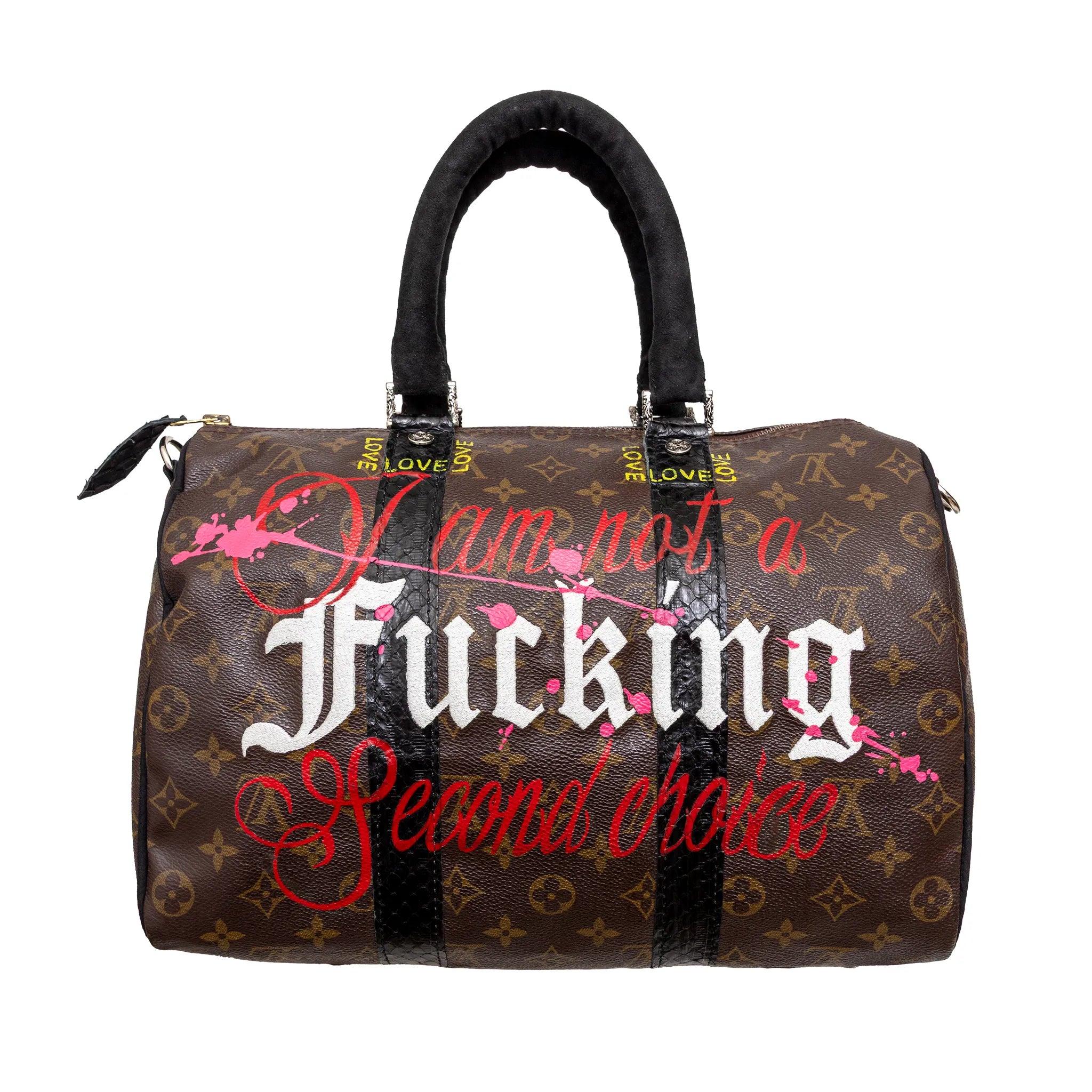 Philip Karto’s artwork on Louis Vuitton Speedy 35 features hand painting and embroidery with bold, gaming-inspired details, polished silver hardware. Blending art and luxury in a playful and unique design.
 Remarks: There are pen marks inside the