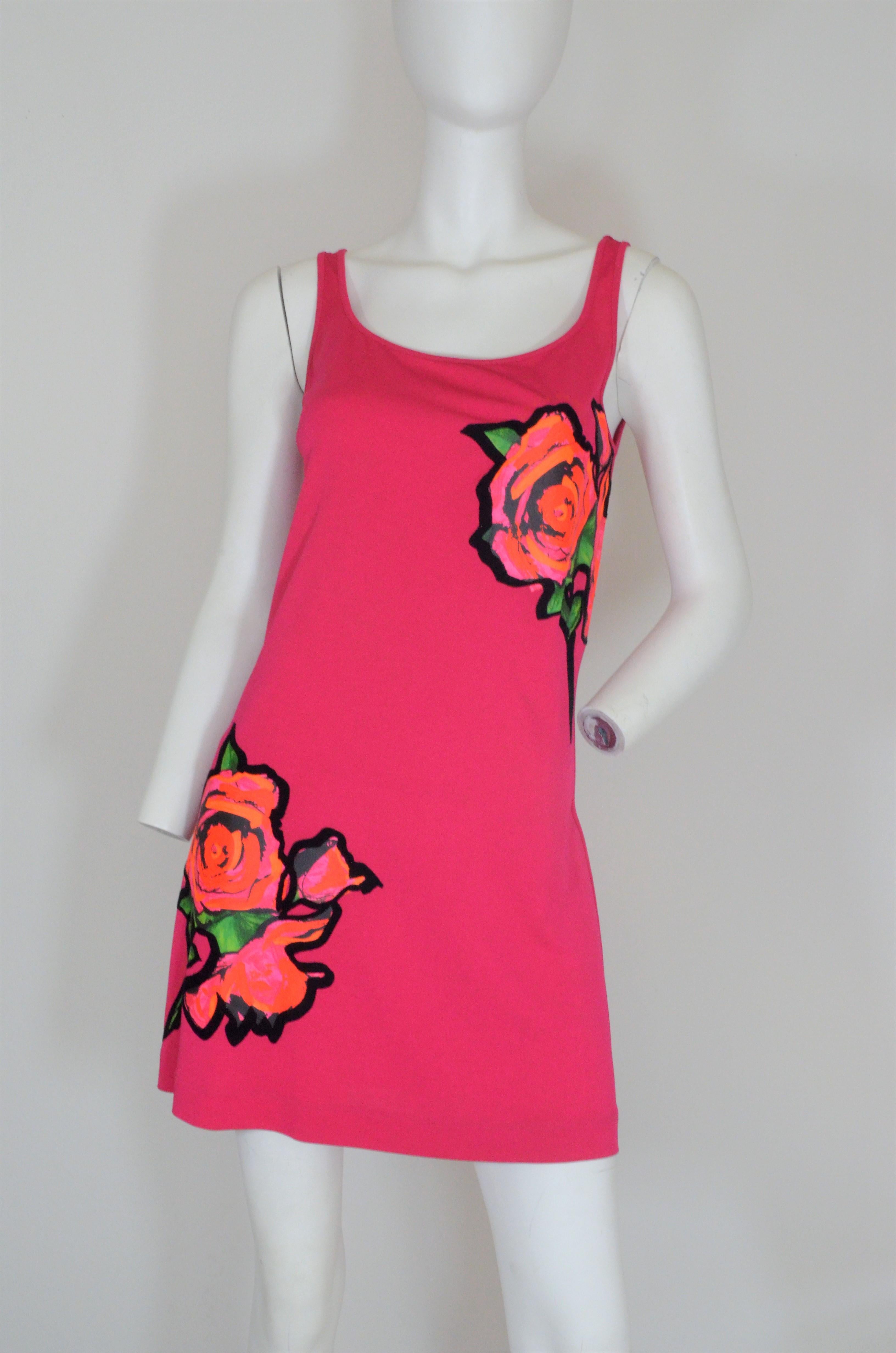Louis Vuitton x Stephen Sprouse Jersey Dress with Flower Motif -- Dress is featured in a bright pink color with a black velvet outlining on the floral painted design. Dress is a size 38. 100% viscose, Made in Italy.

Measurements:
bust 34'', waist