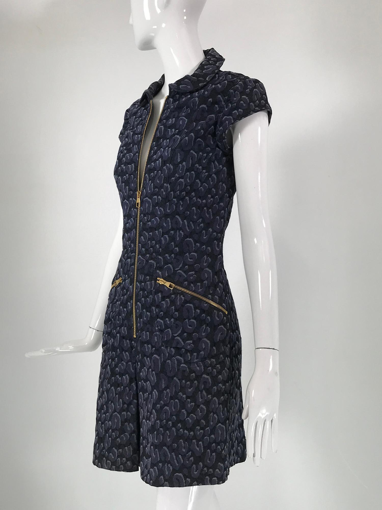 Louis Vuitton X Stephen Sprouse leopard print, cap sleeve, zipper front denim dress. Princess seam fitted cap sleeve dress, closes at the front with a chunky gold brass zipper, there are angled hip front zipper pockets at each front. Round collar at