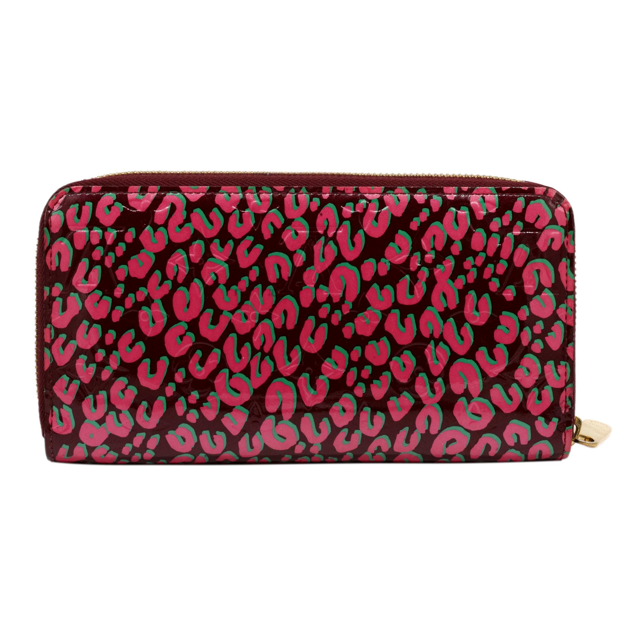 Louis Vuitton x Stephen Sprouse Limited Edition Rouge Fauviste & Corail Monogram Leopard Zippy Wallet, 2010. In 2008, the iconic fashion house Louis Vuitton creative director Marc Jacobs collaborated with legendary designer and childhood