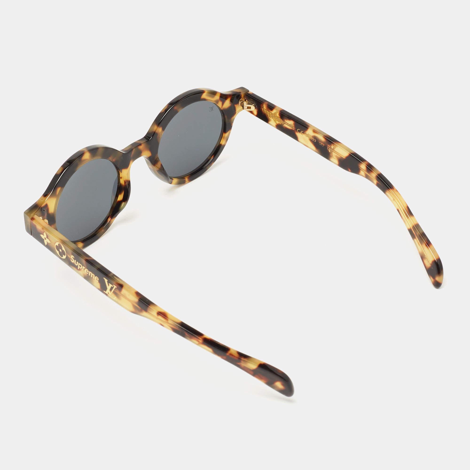 Louis Vuitton's collaboration with NYC streetwear brand, Supreme, was such a fresh merge that, to this day, the designs from that line are sought-after. This gorgeous pair of sunglasses from the collaboration has a tortoise round frame with LV
