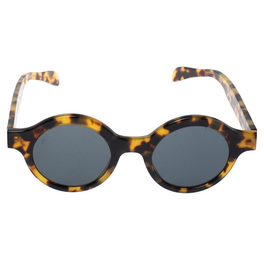 Louis Vuitton's collaboration with NYC streetwear brand, Supreme, was such a fresh merge that to this day, the designs from that line are sought-after. This gorgeous pair of sunglasses from the collaboration has a Havana-brown round frame with LV