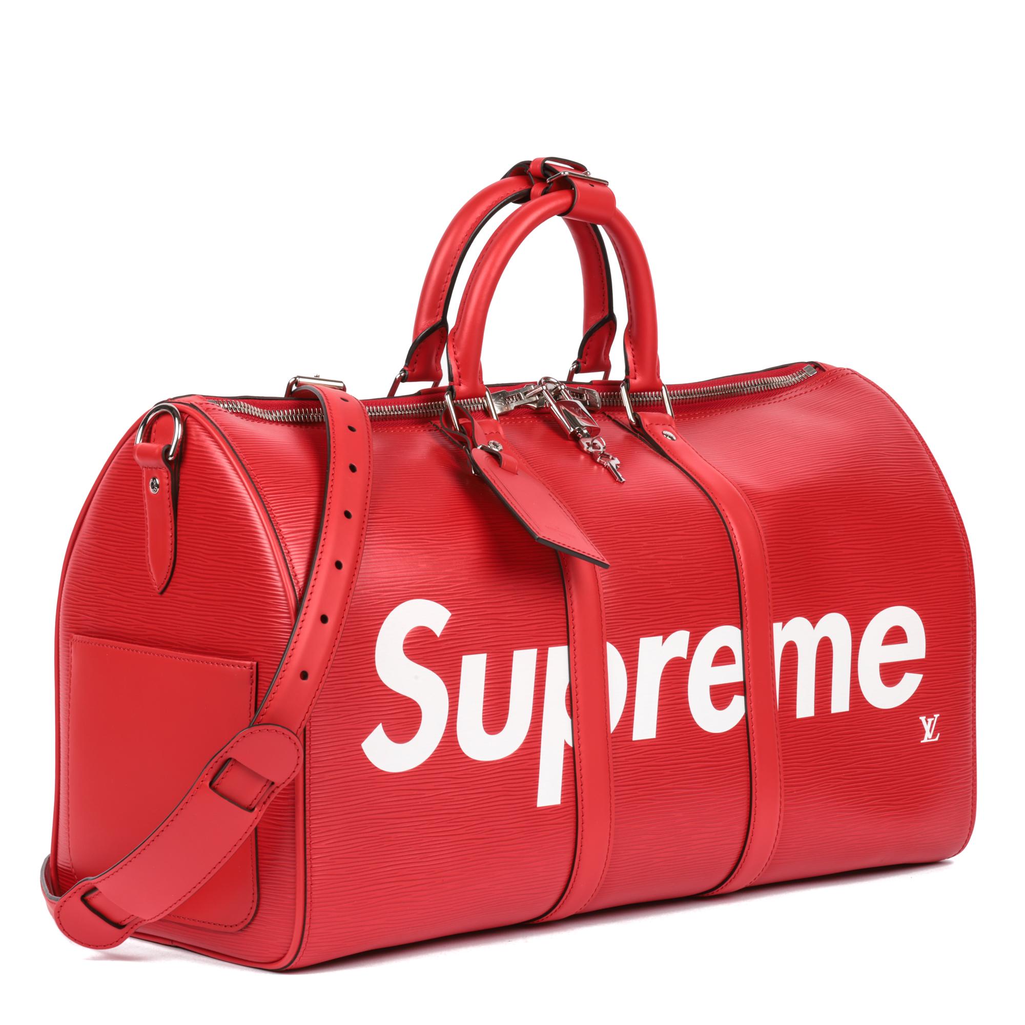 LOUIS VUITTON
X Supreme Red Epi Leather Keepall 45cm Bandouliere

Serial Number: BA2137
Age (Circa): 2017
Accompanied By: Louis Vuitton Dust Bag, Box, Louis Vuitton Invoice, Shoulder Strap, Luggage Tag, Padlock, Keys
Authenticity Details: Date Stamp