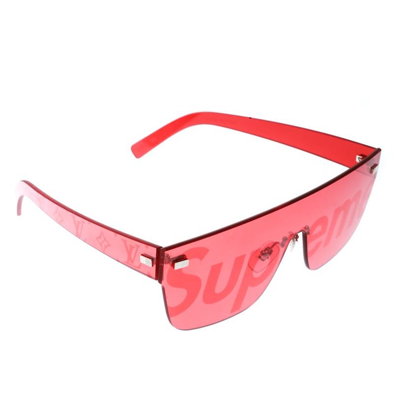 Louis Vuitton x Supreme collection is making a loud fashion presence which is hard to ignore. These City Mask sunglasses are from the same collection and are too cool to be worn with anything ordinary. Rendered in red acetate, the pair is designed
