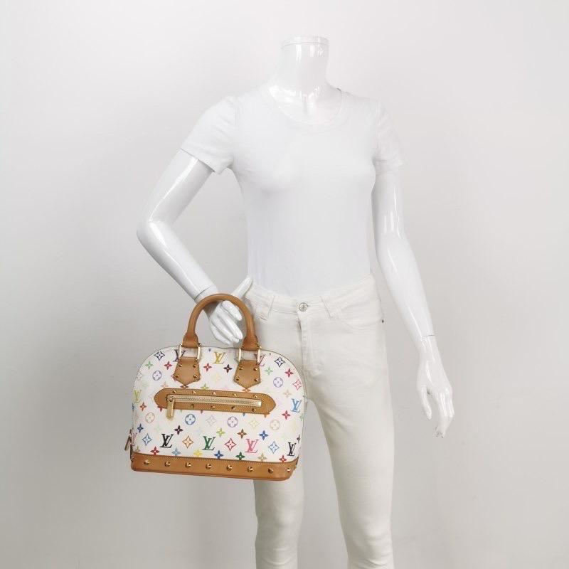 Design by the French fashion house, Louis Vuitton in collaboration with Takashi Murakami.

Condition: Good

This authentic preloved/ preowned Louis Vuitton bag is in good condition with moderate signs of use. Water mark on the leather, light stains