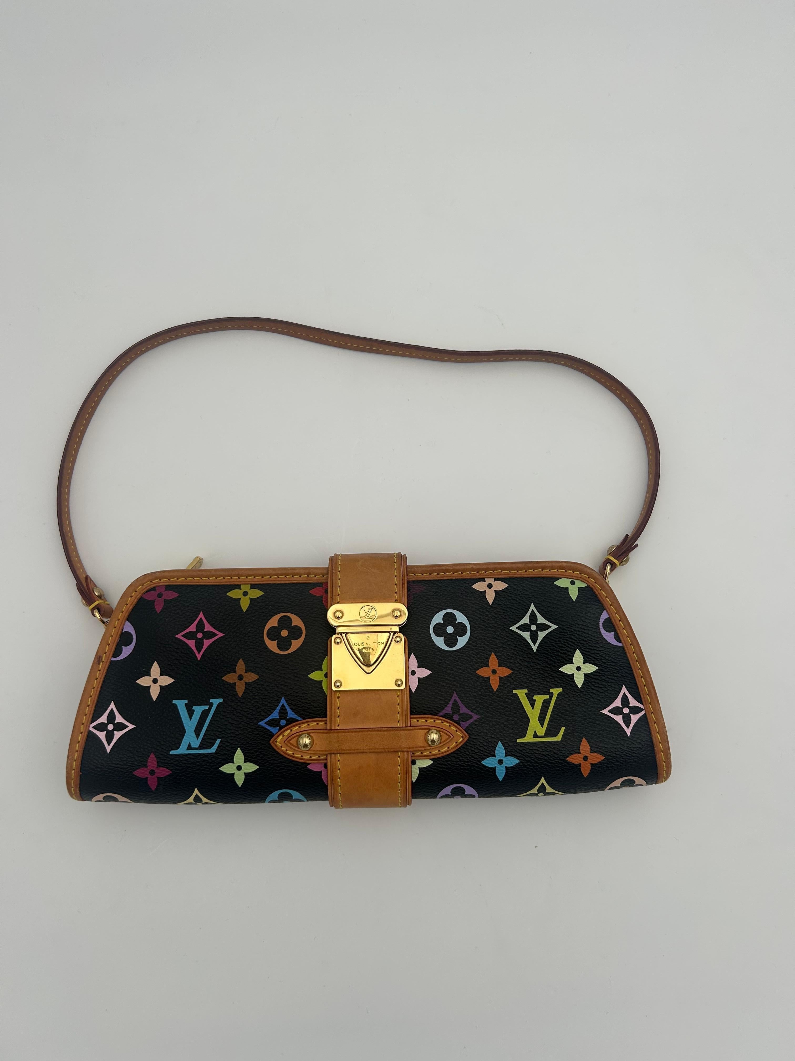 Louis Vuitton x Takashi Murakami Schwarze Shirley Umhängetasche. Diese schöne und originelle Tasche aus der Frühjahr/Sommer-Kollektion 2003 ist ein seltenes Designstück des zeitgenössischen Künstlers Takashi Murakami. 
In gutem Zustand. Es ist in