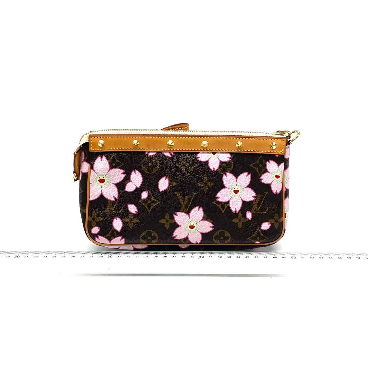 Louis Vuitton x Takashi Murakami Cherry Blossom on Brown Monogram Pochette Accessoire
These are professional photos of the actual bag.
The Pochette Accessoire Bag is one of the most iconic design by the French fashion house, Louis Vuitton in