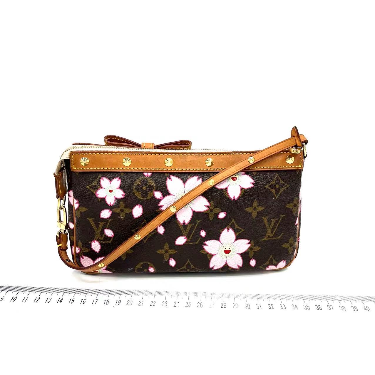 Louis Vuitton x Takashi Murakami Cherry Blossom on Brown Monogram Pochette Accessoire
 These are professional photos of the actual bag .
 The Pochette Accessoire Bag is one of the most iconic design by the French fashion house, Louis Vuitton in
