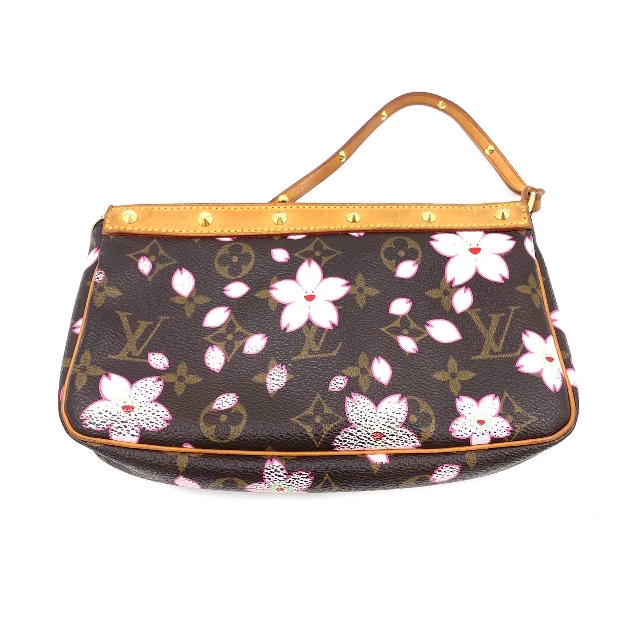 Louis Vuitton x Takashi Murakami Cherry Blossom on Brown Monogram Pochette Accessoire
 These are professional photos of the actual bag .
 The Pochette Accessoire Bag is one of the most iconic design by the French fashion house, Louis Vuitton in