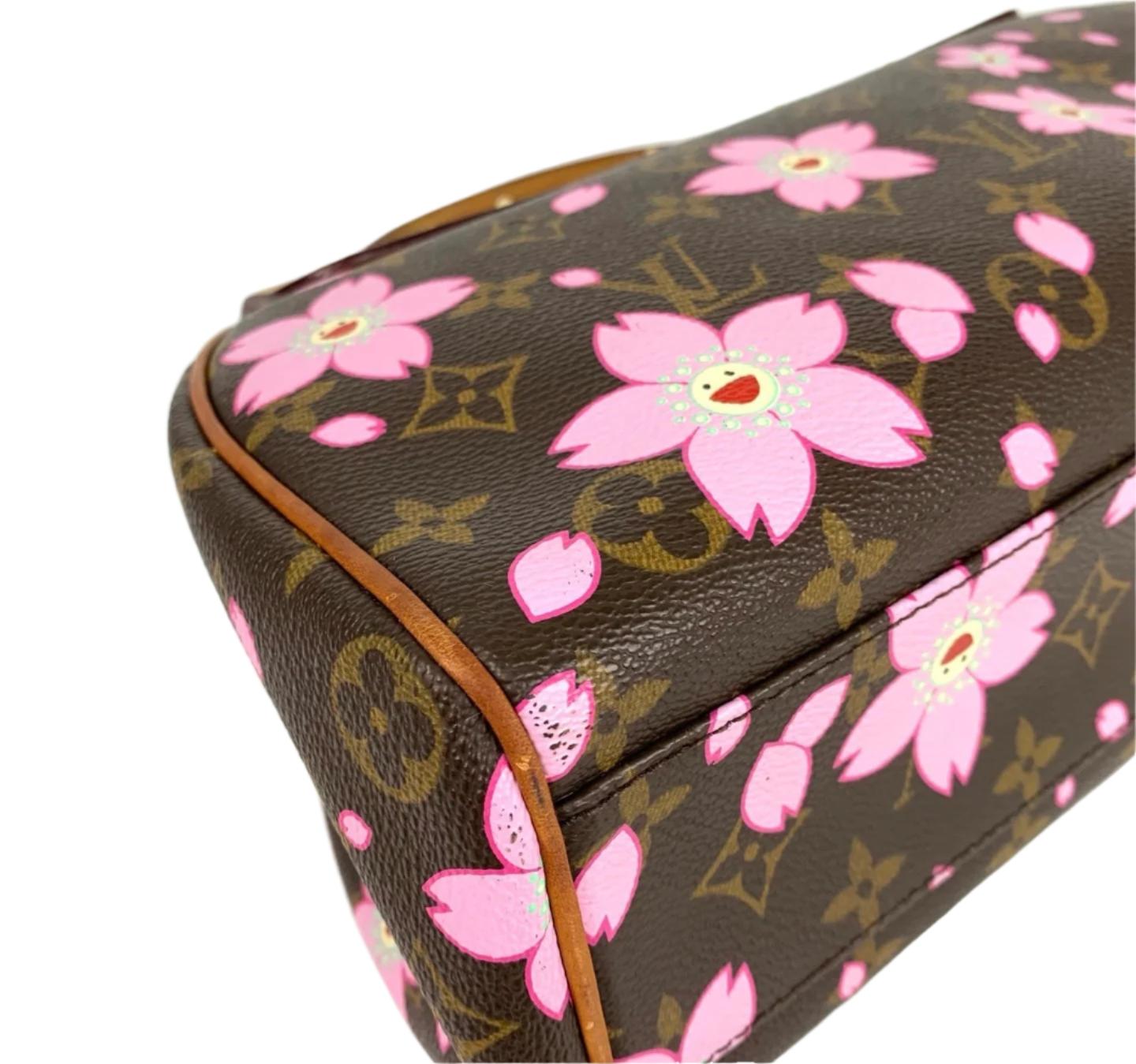 Design by the French fashion house, Louis Vuitton in collaboration with Takashi Murakami.

Condition: Good CONDITION

This authentic preloved/ preowned Louis Vuitton bag is in good condition with moderate signs of use. Water mark on the leather,