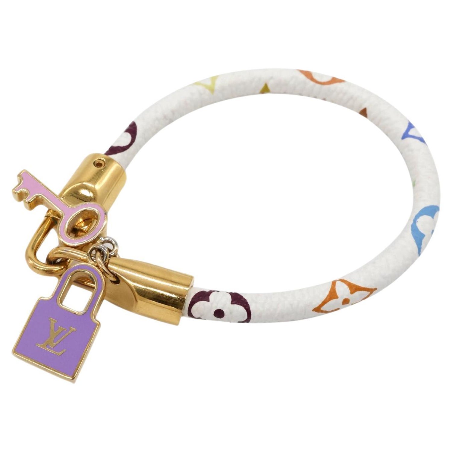 Louis Vuitton Lock And Key Bracelet - 2 For Sale on 1stDibs | lv lock and  key bracelet, louis vuitton lock bracelet price, lv padlock bracelet price